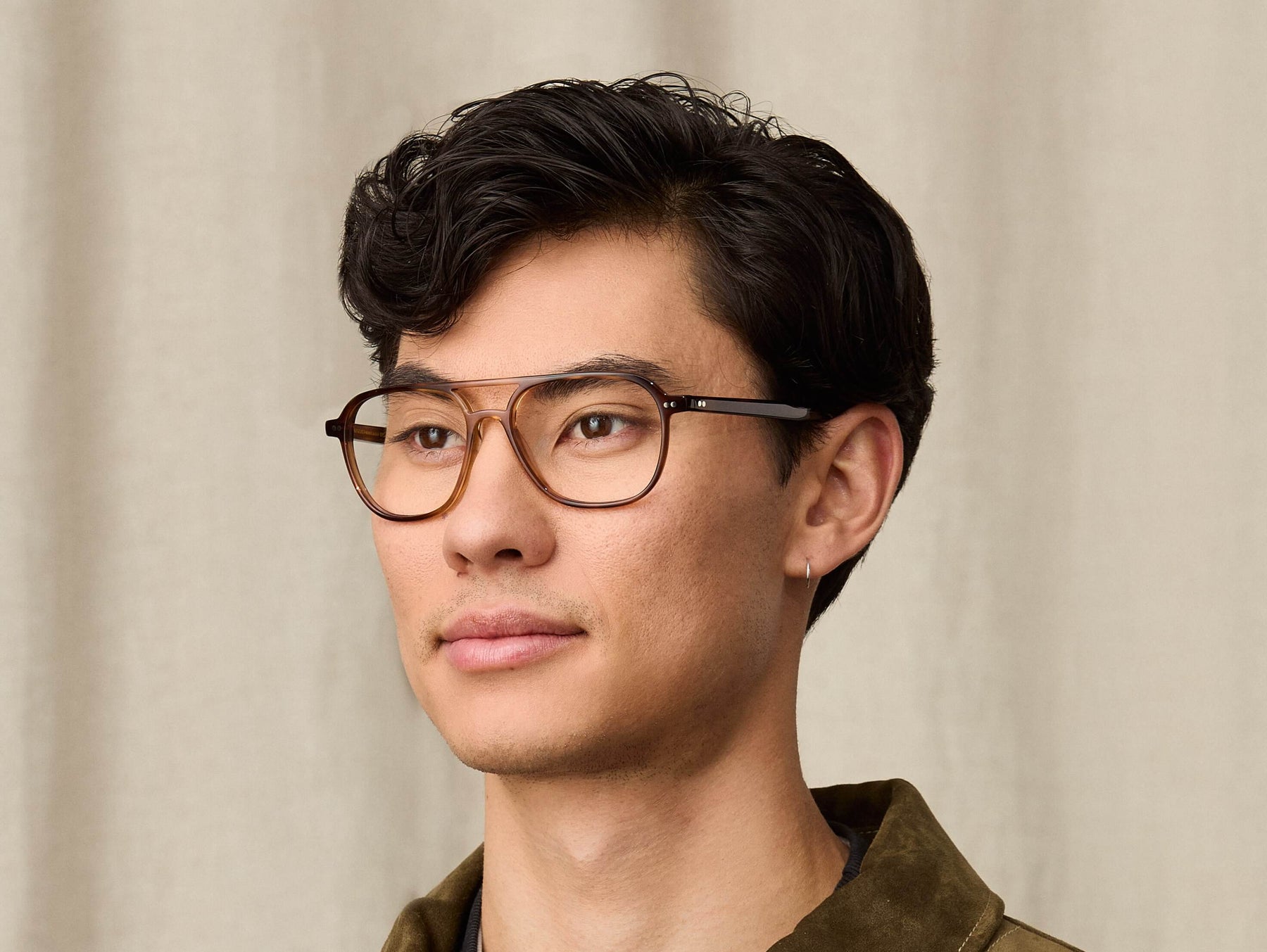 Model is wearing The BJORN in size 55 in Tobacco Model is wearing The BJORN in size 55 in Tobacco