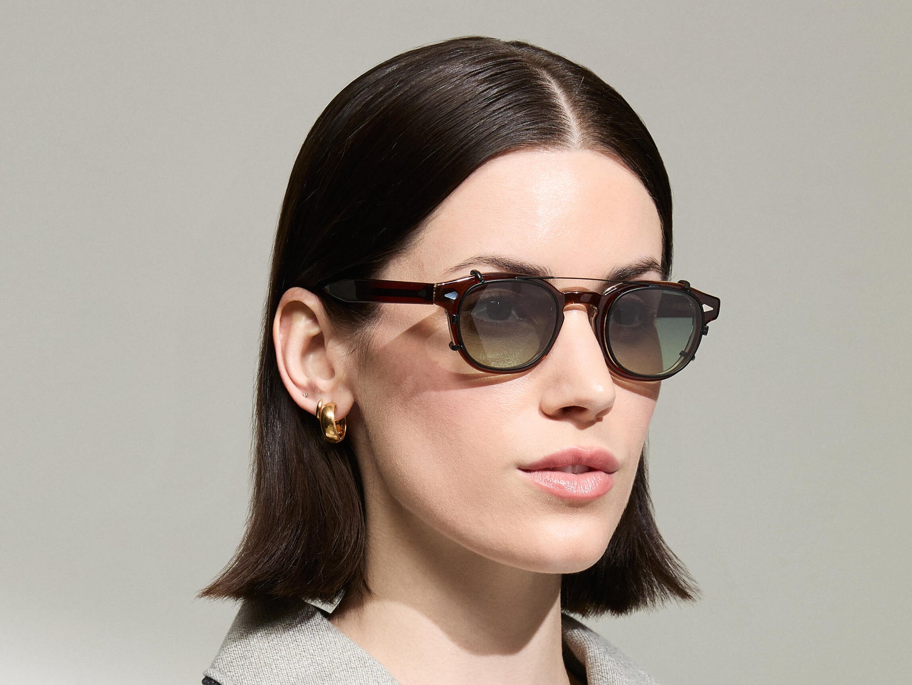 The Model is wearing The CLIPTOSH in Matte Black in size 46 with Forest Wood Tinted Lenses The Model is wearing The CLIPTOSH in Matte Black in size 46 with Forest Wood Tinted Lenses