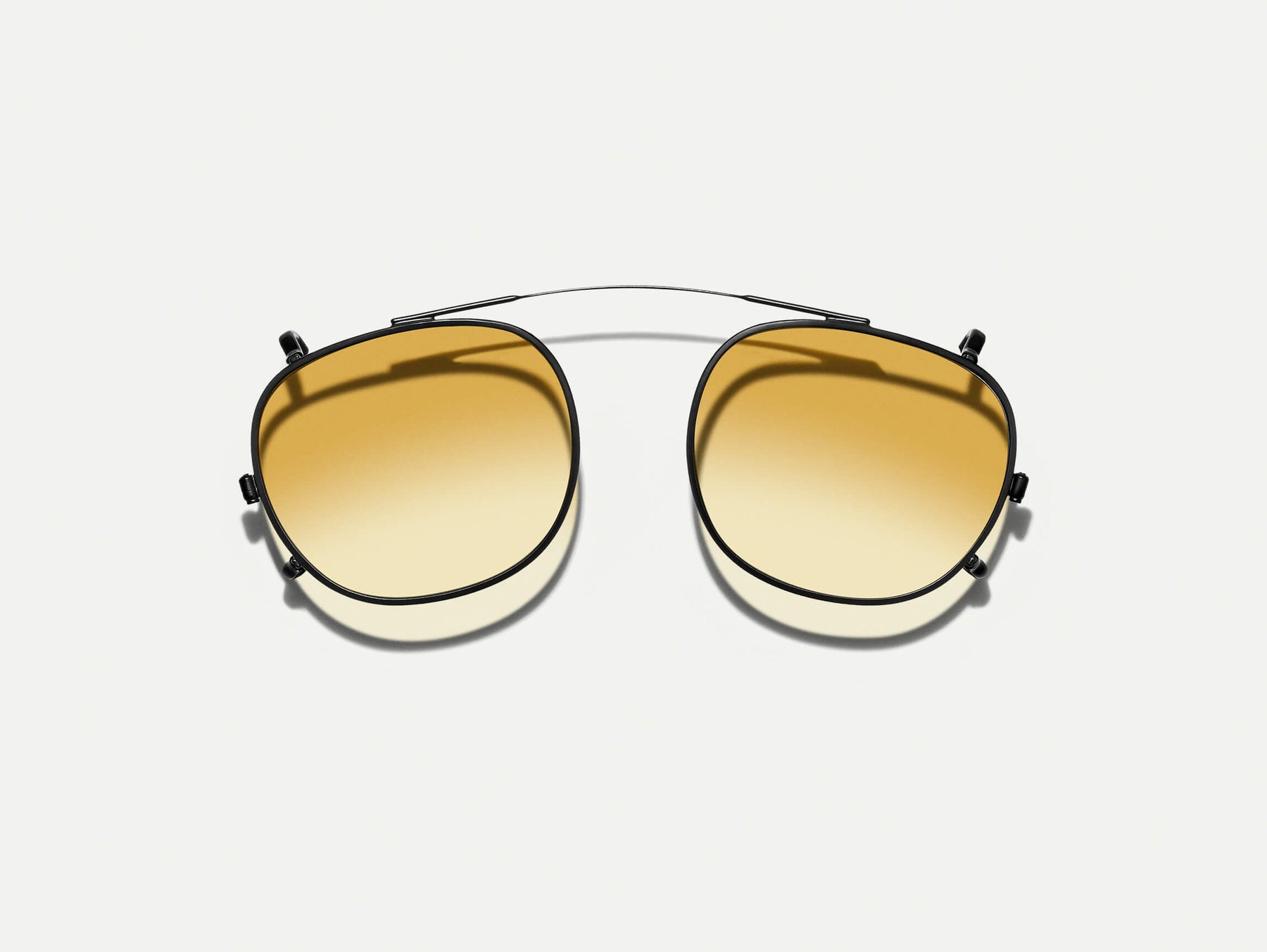 The CLIPTOSH in Matte Black with Chestnut Fade Tinted Lenses The CLIPTOSH in Matte Black with Chestnut Fade Tinted Lenses