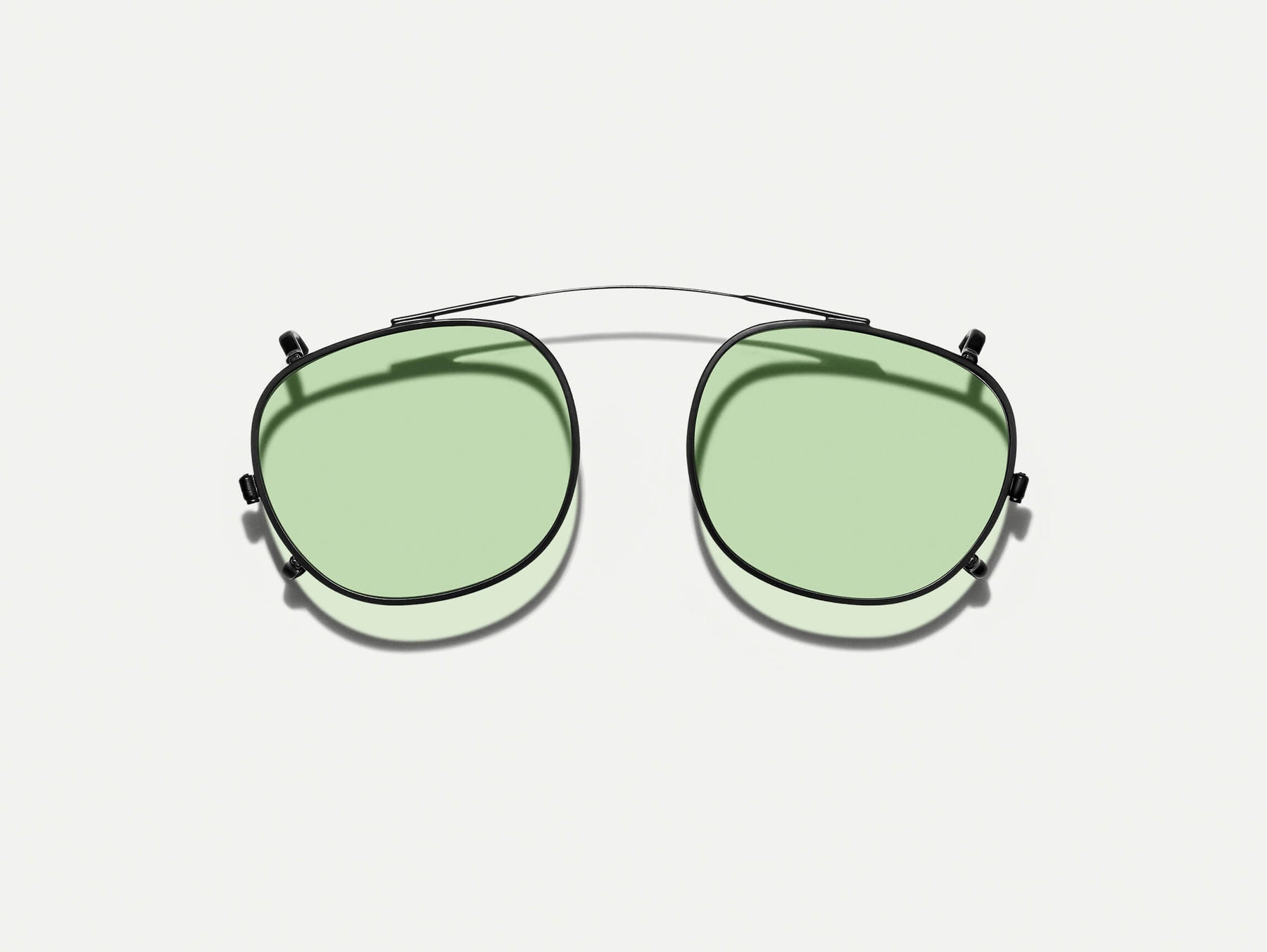 The CLIPTOSH in Matte Black with Limelight Tinted Lenses The CLIPTOSH in Matte Black with Limelight Tinted Lenses