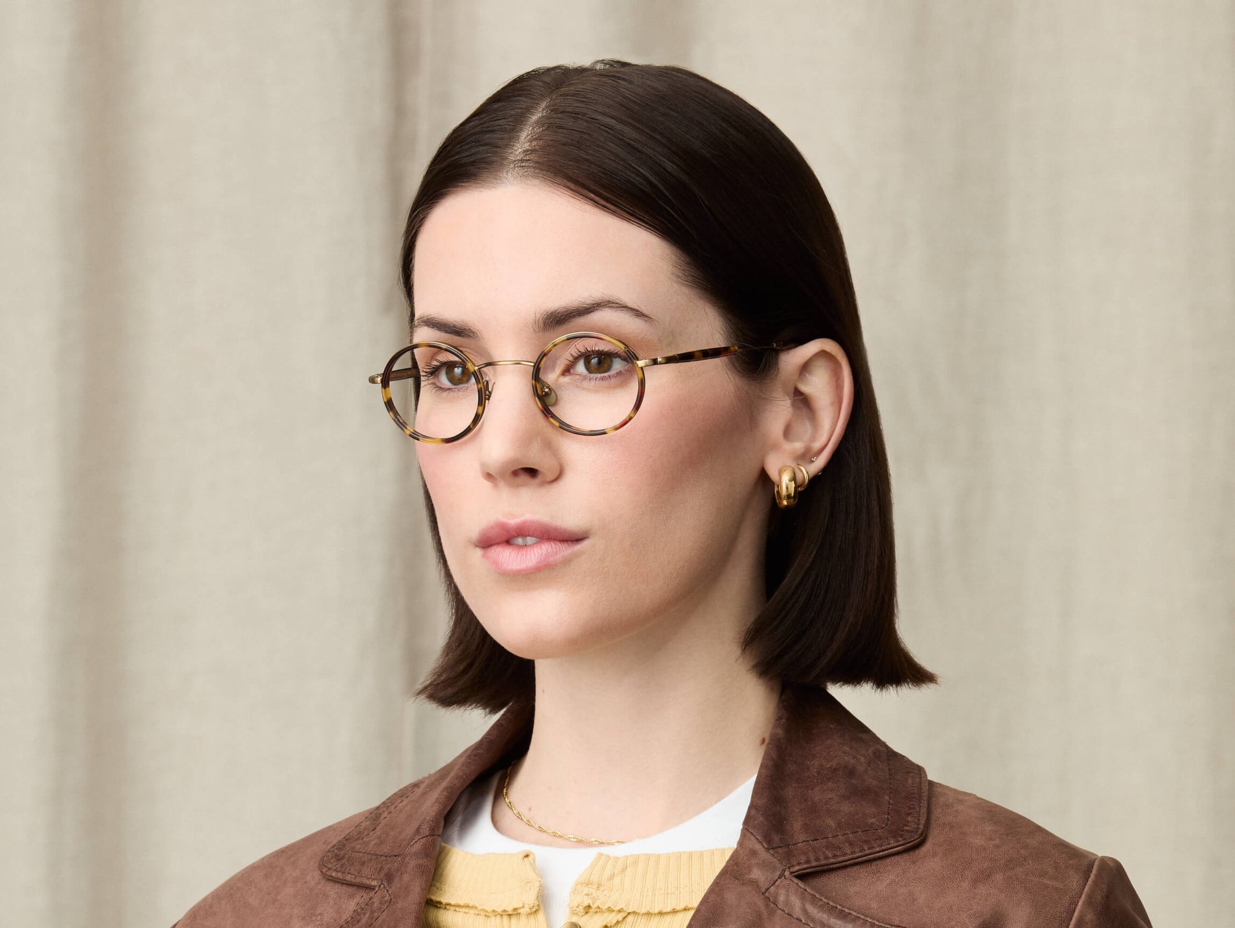 Model is wearing The COSNIC in size 44 in Tortoise Model is wearing The COSNIC in size 44 in Tortoise