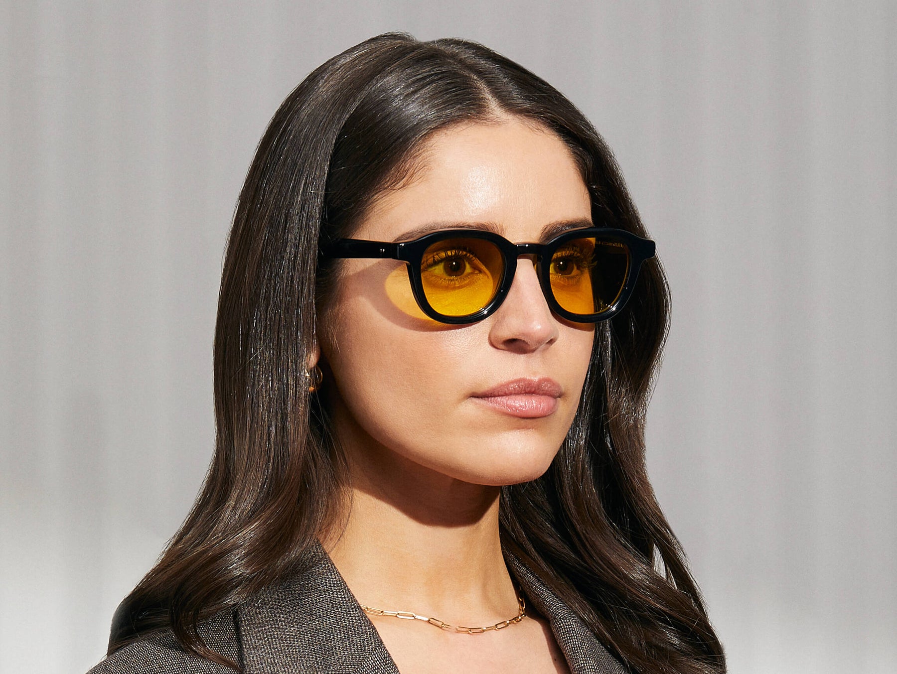 Model is wearing The DAHVEN in Black in size 47 with Mellow Yellow Tinted Lenses Model is wearing The DAHVEN in Black in size 47 with Mellow Yellow Tinted Lenses