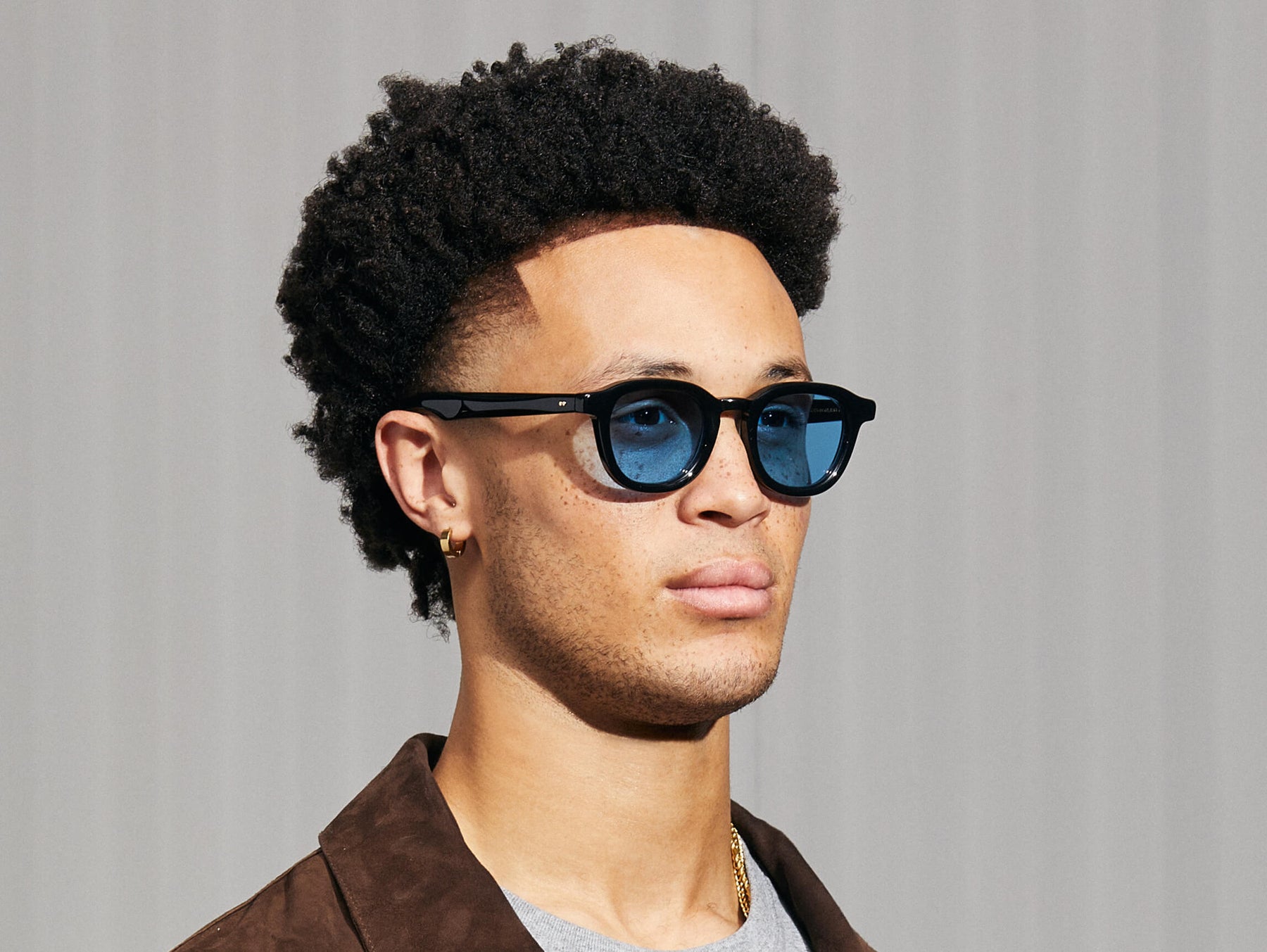 Model is wearing The DAHVEN in Black in size 47 with Celebrity Blue Tinted Lenses Model is wearing The DAHVEN in Black in size 47 with Celebrity Blue Tinted Lenses
