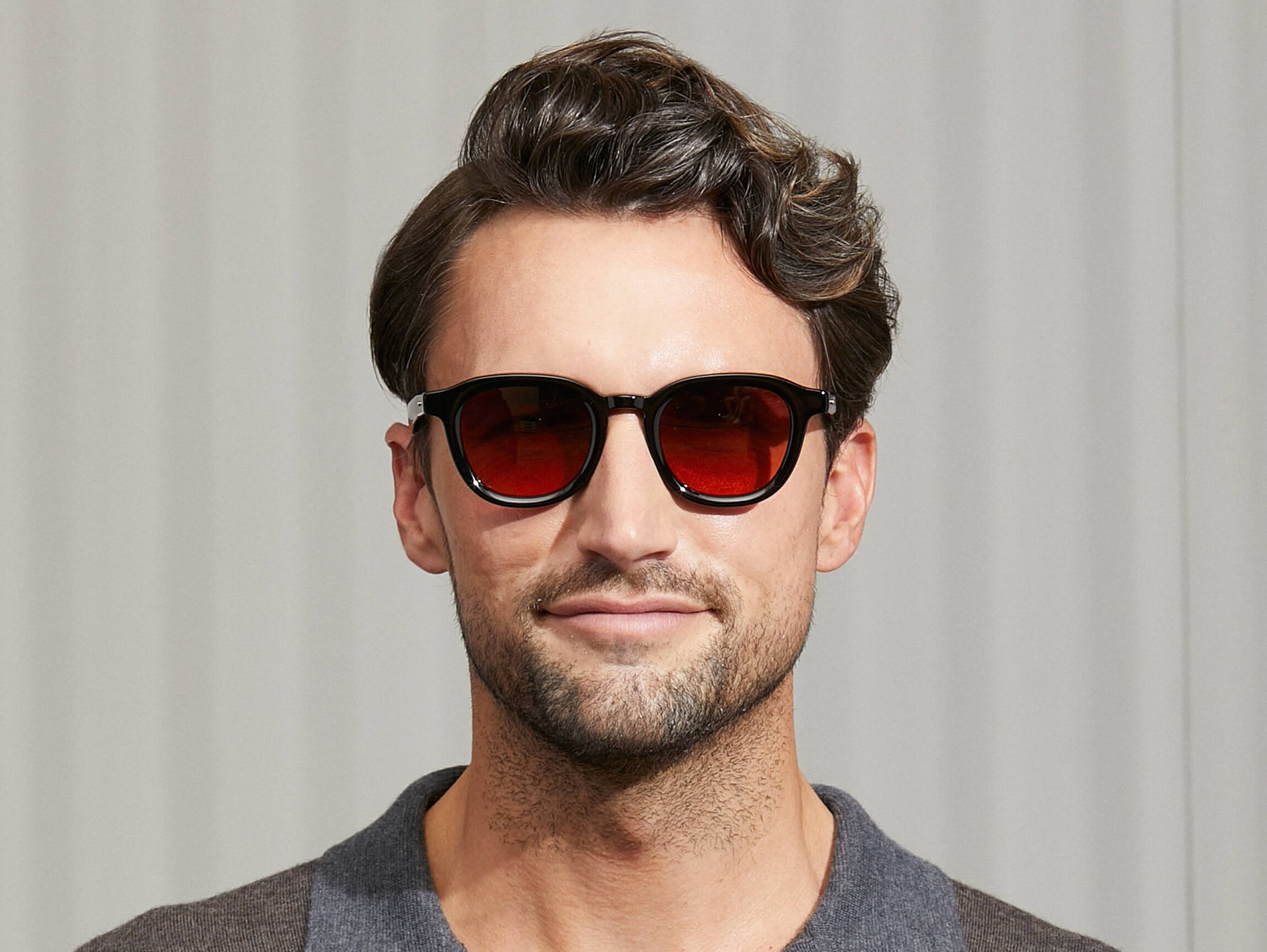 Model is wearing The DAHVEN in Black in size 50 with Cabernet Tinted Lenses Model is wearing The DAHVEN in Black in size 50 with Cabernet Tinted Lenses