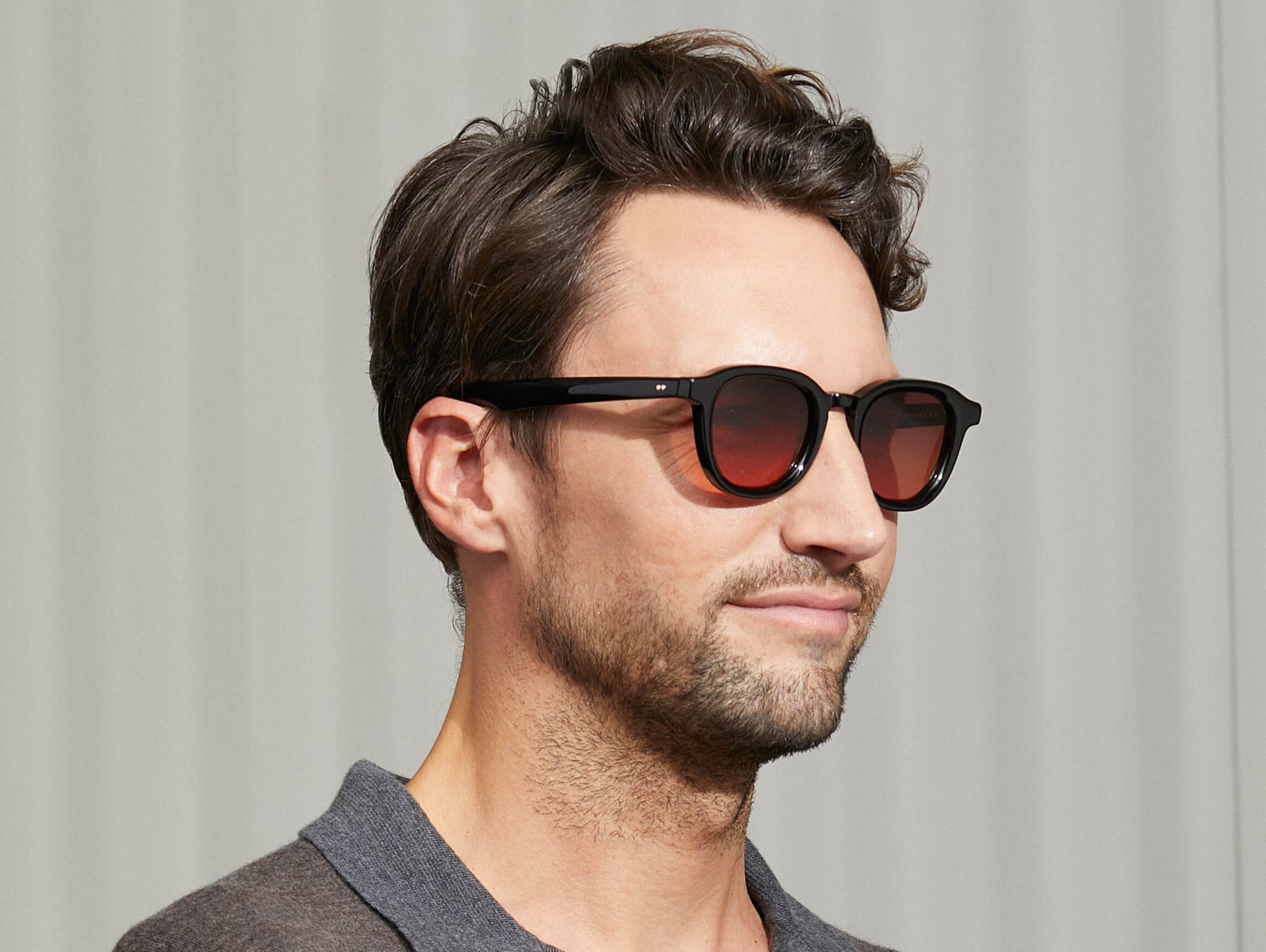 Model is wearing The DAHVEN in Black in size 50 with Cabernet Tinted Lenses Model is wearing The DAHVEN in Black in size 50 with Cabernet Tinted Lenses