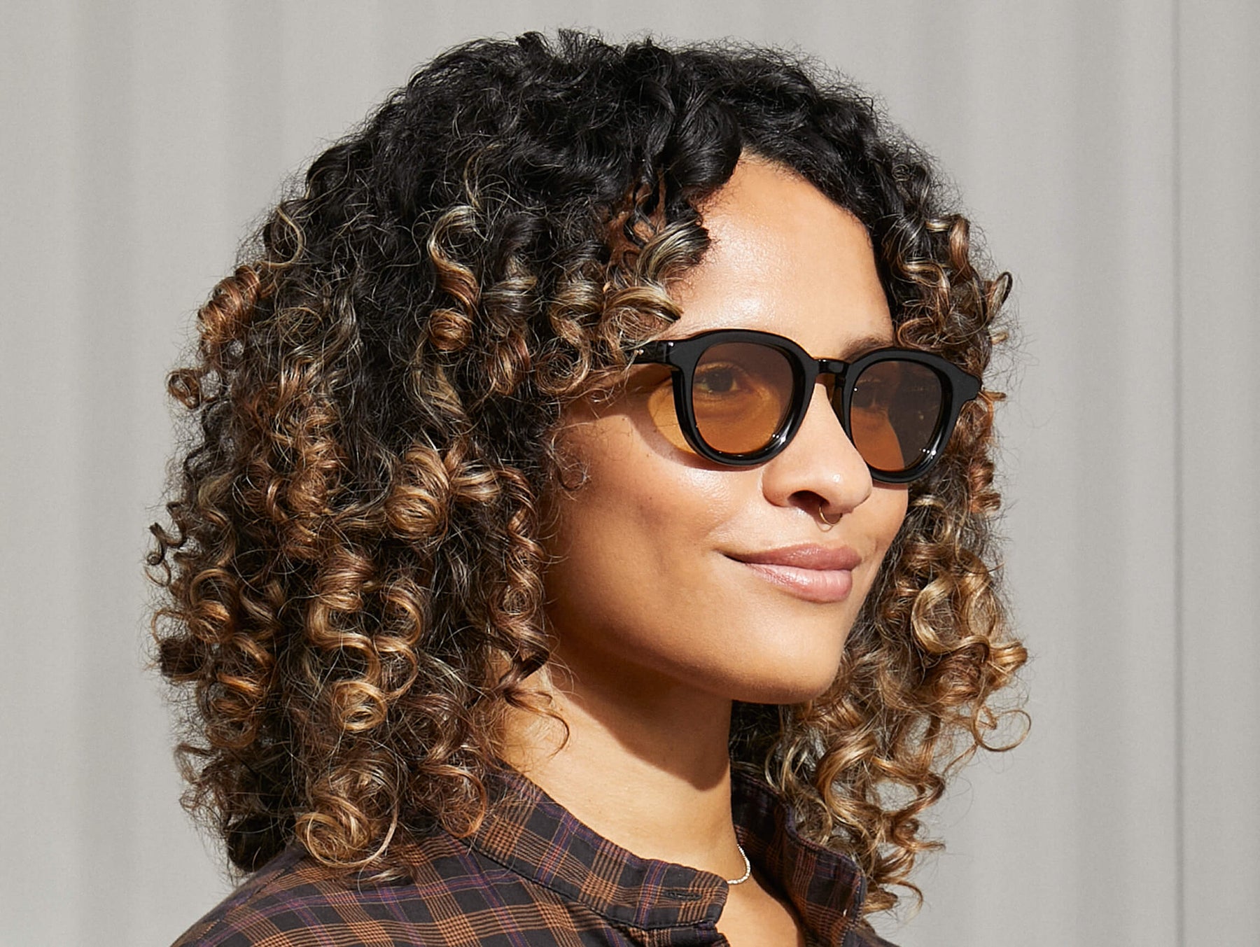 Model is wearing The DAHVEN in Black in size 47 with Amber Tinted Lenses Model is wearing The DAHVEN in Black in size 47 with Amber Tinted Lenses
