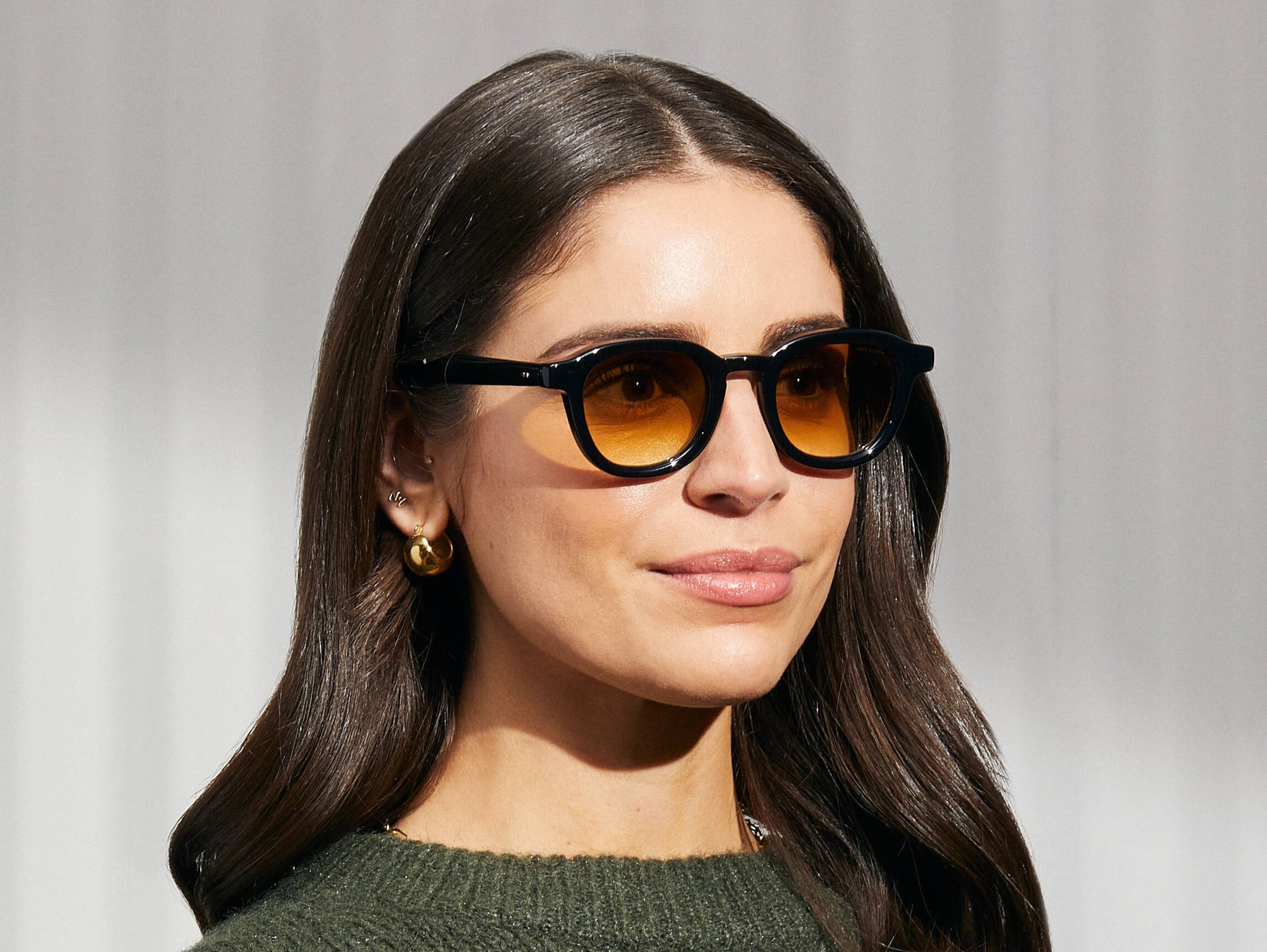 Model is wearing The DAHVEN in Black in size 47 with Chestnut Fade Tinted Lenses Model is wearing The DAHVEN in Black in size 47 with Chestnut Fade Tinted Lenses