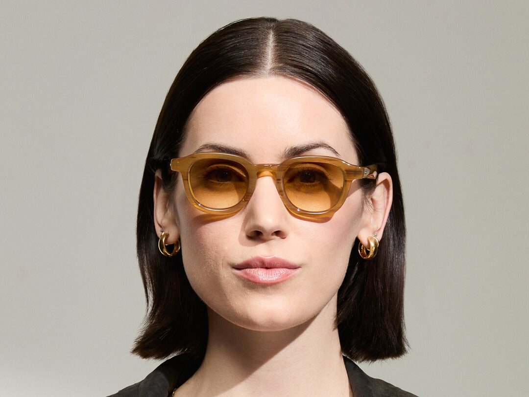 Model is wearing The DAHVEN in Blonde in size 44 with Chestnut Fade Tinted Lenses Model is wearing The DAHVEN in Blonde in size 44 with Chestnut Fade Tinted Lenses