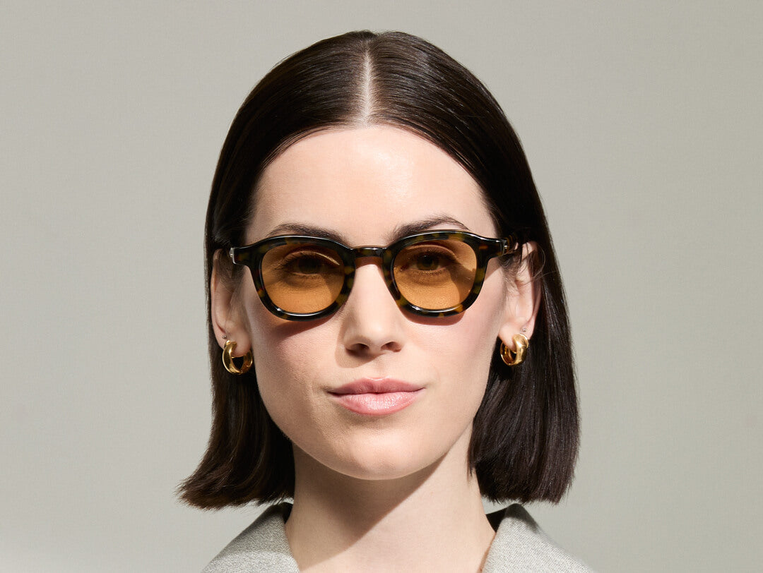 Model is wearing The DAHVEN in Tortoise in size 44 with Light Amber Tinted Lenses Model is wearing The DAHVEN in Tortoise in size 44 with Light Amber Tinted Lenses