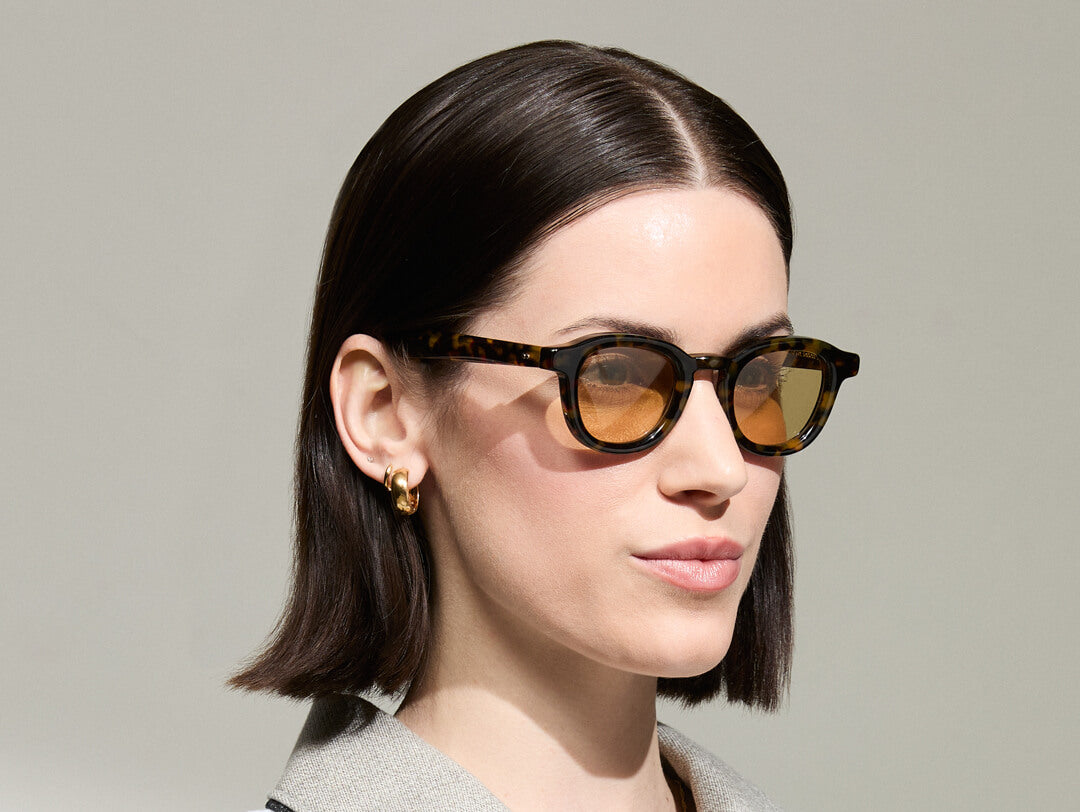 Model is wearing The DAHVEN in Tortoise in size 44 with Light Amber Tinted Lenses Model is wearing The DAHVEN in Tortoise in size 44 with Light Amber Tinted Lenses