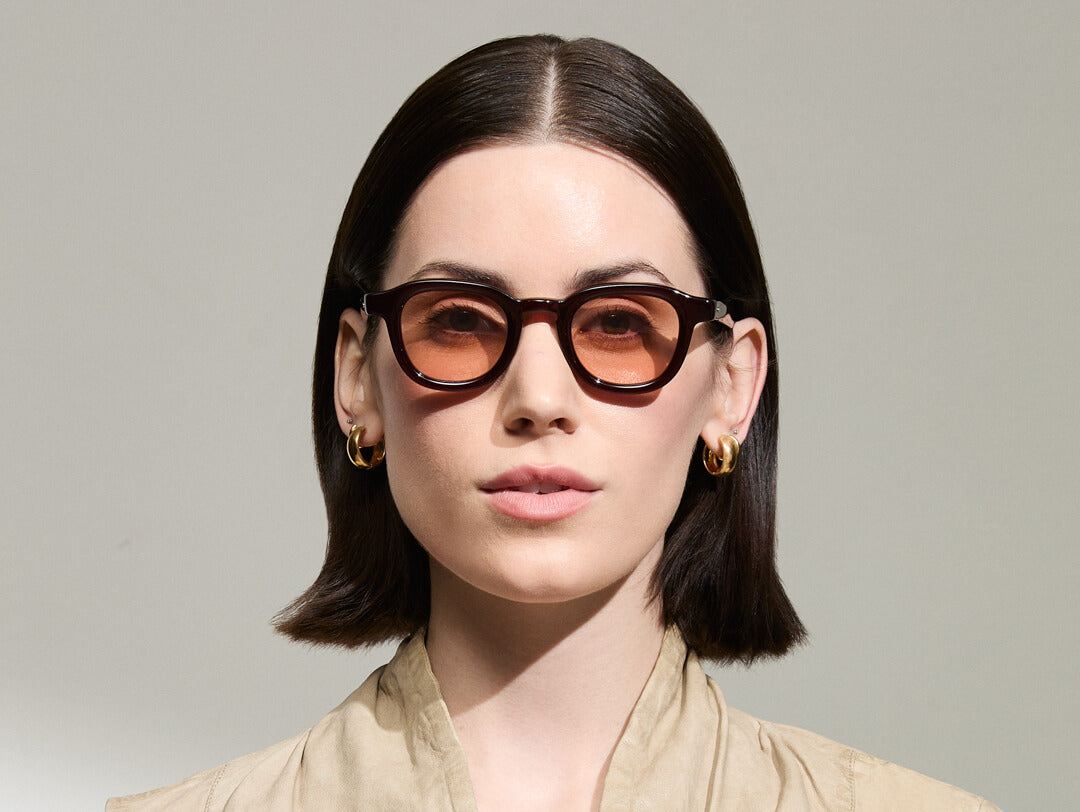 Model is wearing The DAHVEN in Burgundy in size 44 with New York Rose Tinted Lenses Model is wearing The DAHVEN in Burgundy in size 44 with New York Rose Tinted Lenses