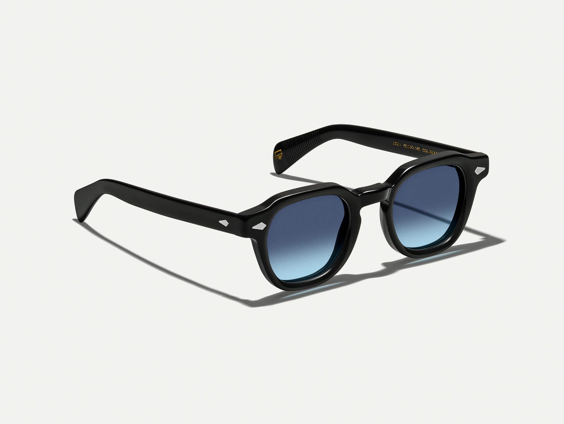 The DOLT in Black with Denim Blue Tinted Lenses The DOLT in Black with Denim Blue Tinted Lenses