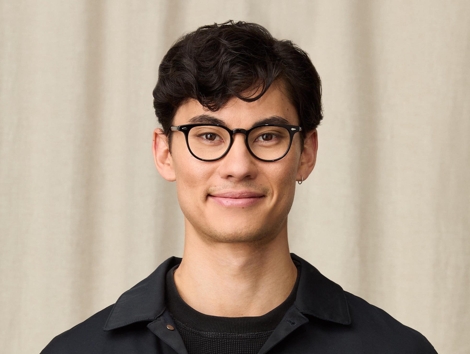 Model is wearing The FEVEL in size 49 in Black Model is wearing The FEVEL in size 49 in Black