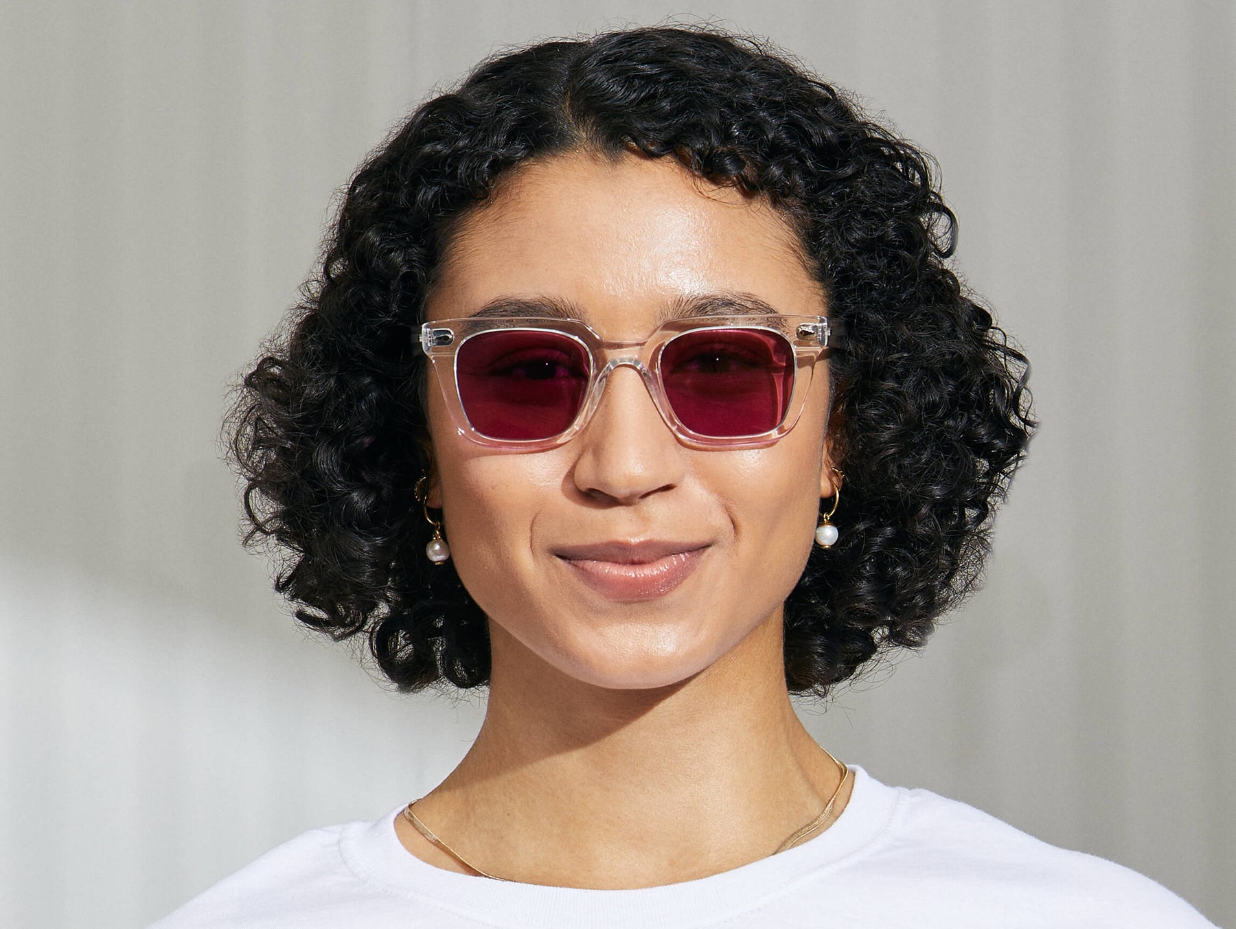 Model is wearing The GROBER in Crystal in size 48 with Purple Nurple Tinted Lenses Model is wearing The GROBER in Crystal in size 48 with Purple Nurple Tinted Lenses