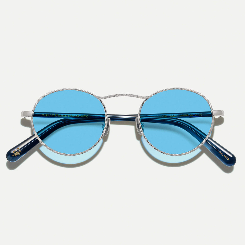 #color_silver/ink | The KANAKA SUN in Silver/Ink with Celebrity Blue Tinted Lenses