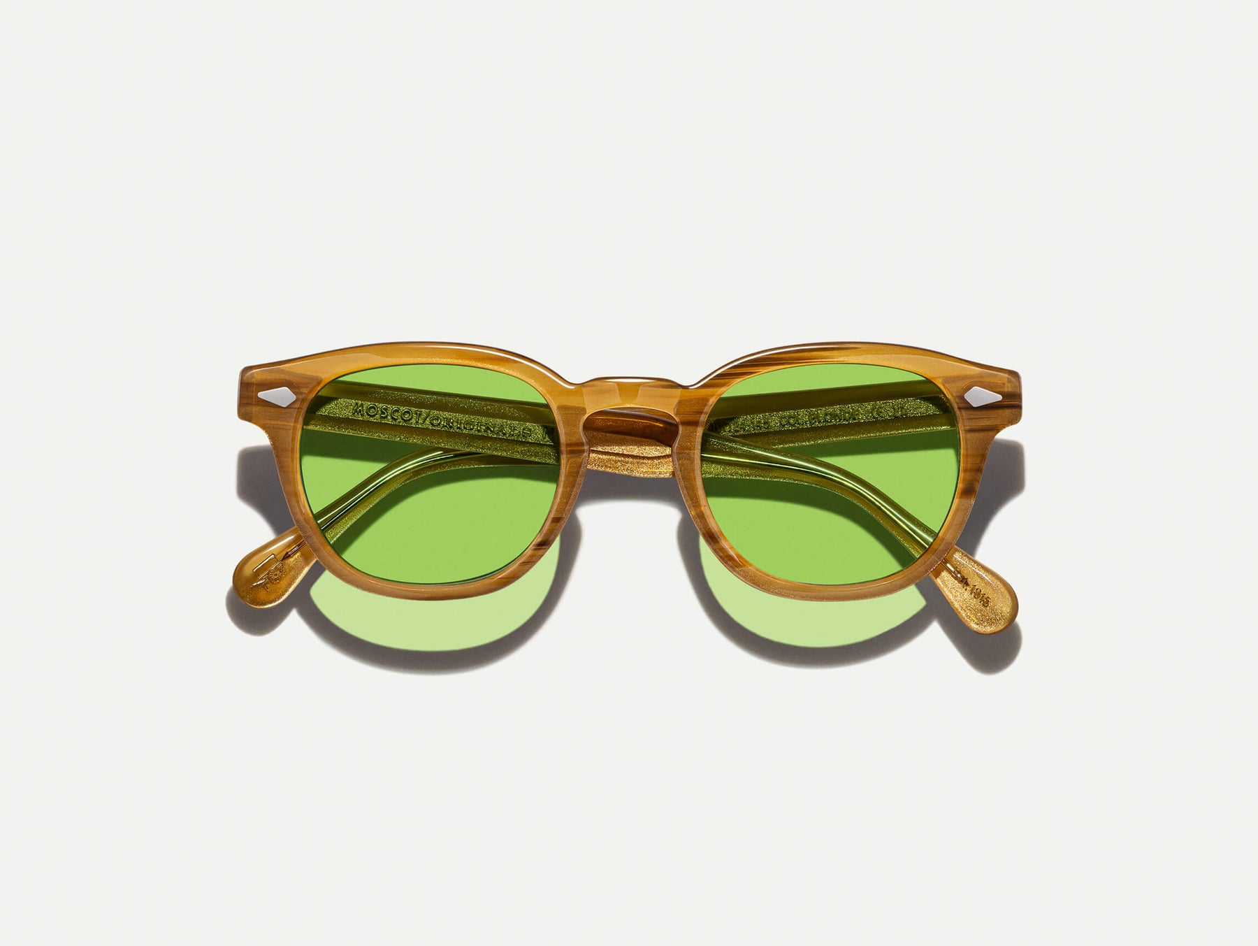 The LEMTOSH Blonde with Garnet Green Tinted Lenses The LEMTOSH Blonde with Garnet Green Tinted Lenses