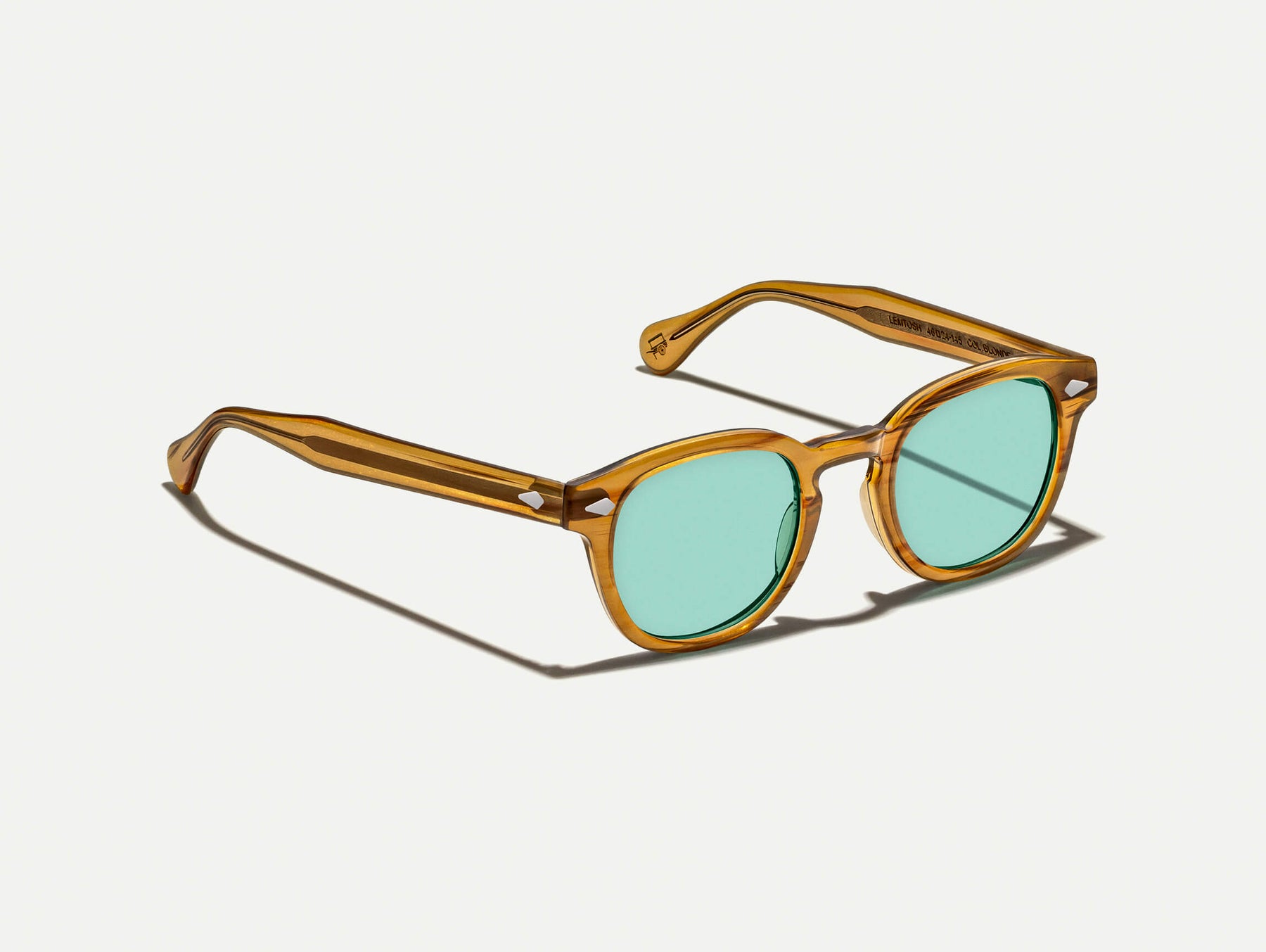 The LEMTOSH Blonde with Turquoise Tinted Lenses The LEMTOSH Blonde with Turquoise Tinted Lenses
