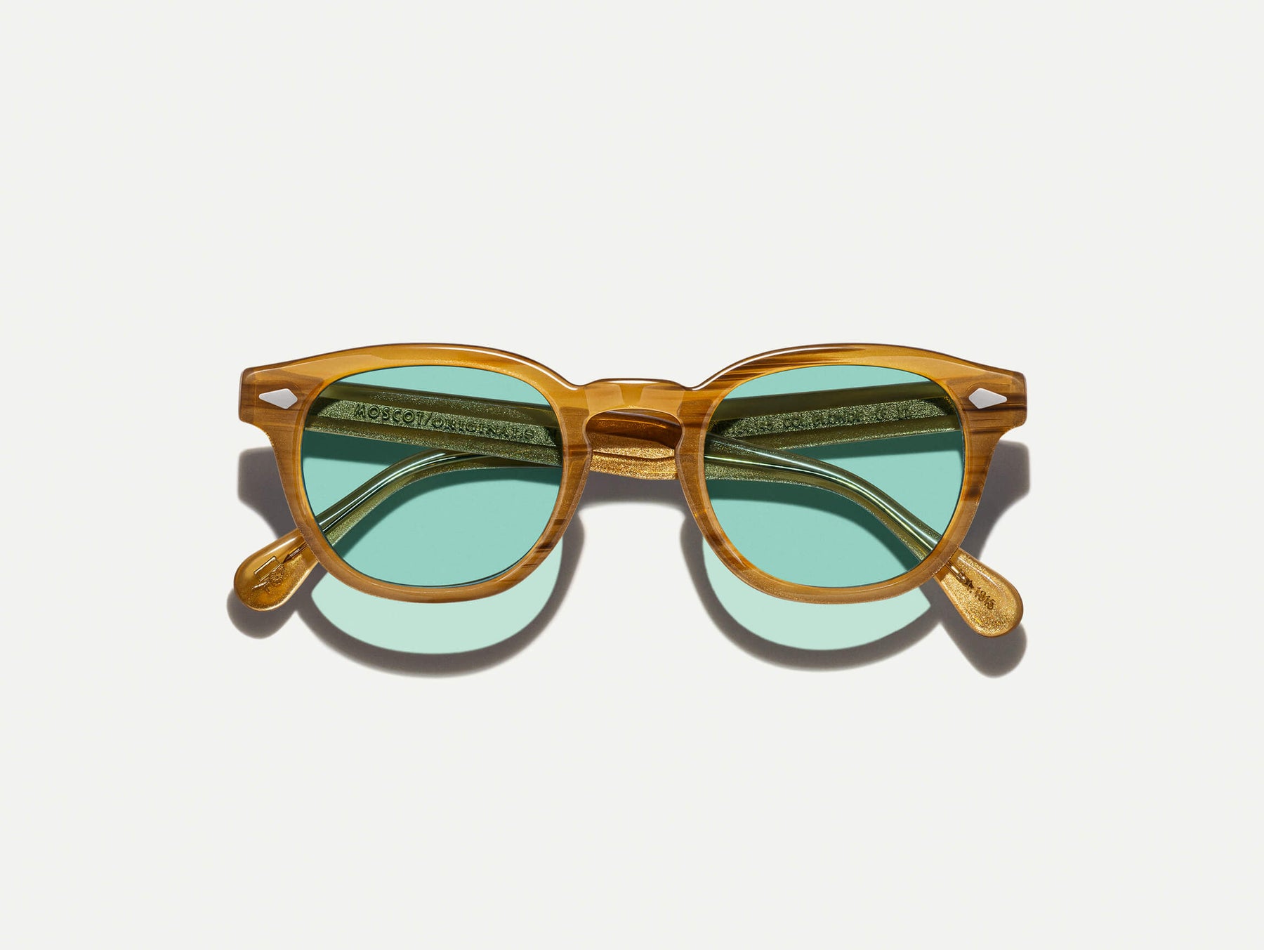 The LEMTOSH Blonde with Turquoise Tinted Lenses The LEMTOSH Blonde with Turquoise Tinted Lenses