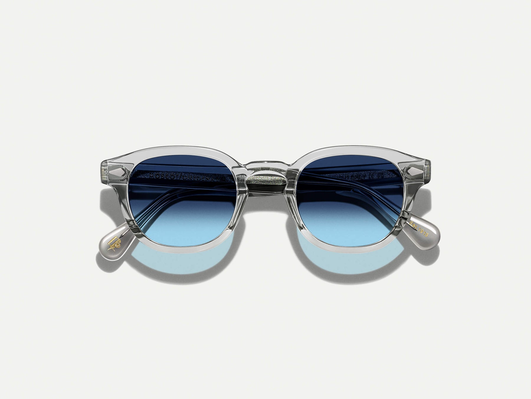 The LEMTOSH Light Grey with Denim Blue Tinted Lenses The LEMTOSH Light Grey with Denim Blue Tinted Lenses