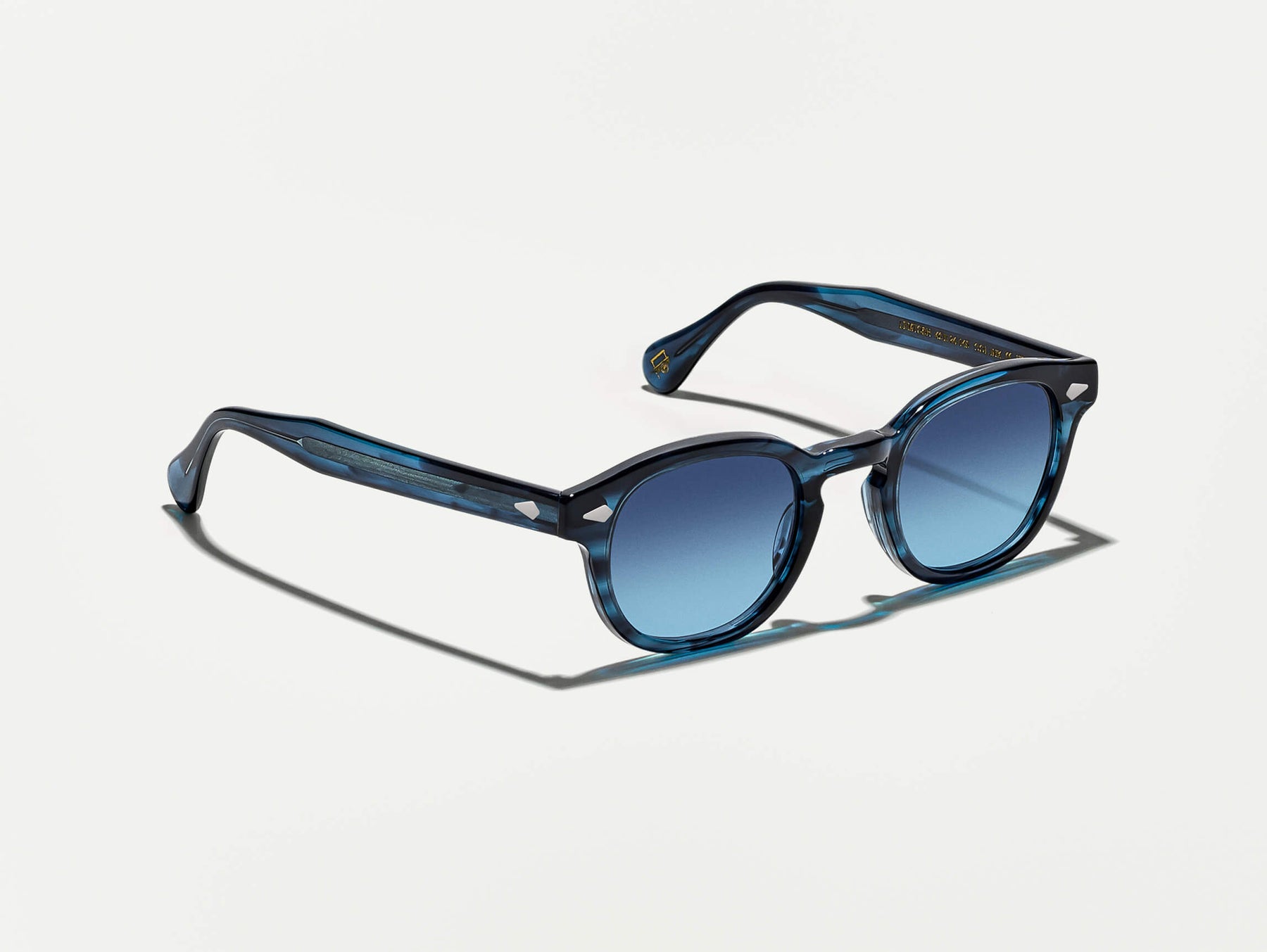 The LEMTOSH in Ink with Denim Blue Tinted Lenses The LEMTOSH in Ink with Denim Blue Tinted Lenses
