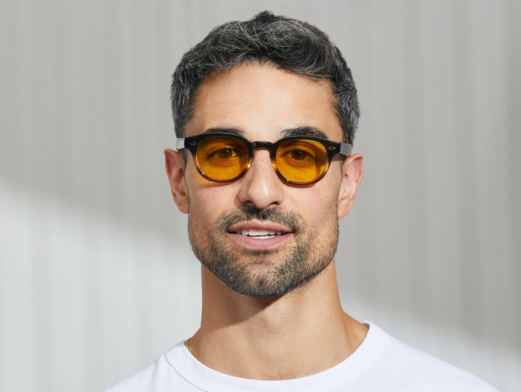 Model is wearing The LEMTOSH in Grey-Brown Fade in size 46 with Mellow Yellow Tinted Lenses Model is wearing The LEMTOSH in Grey-Brown Fade in size 46 with Mellow Yellow Tinted Lenses