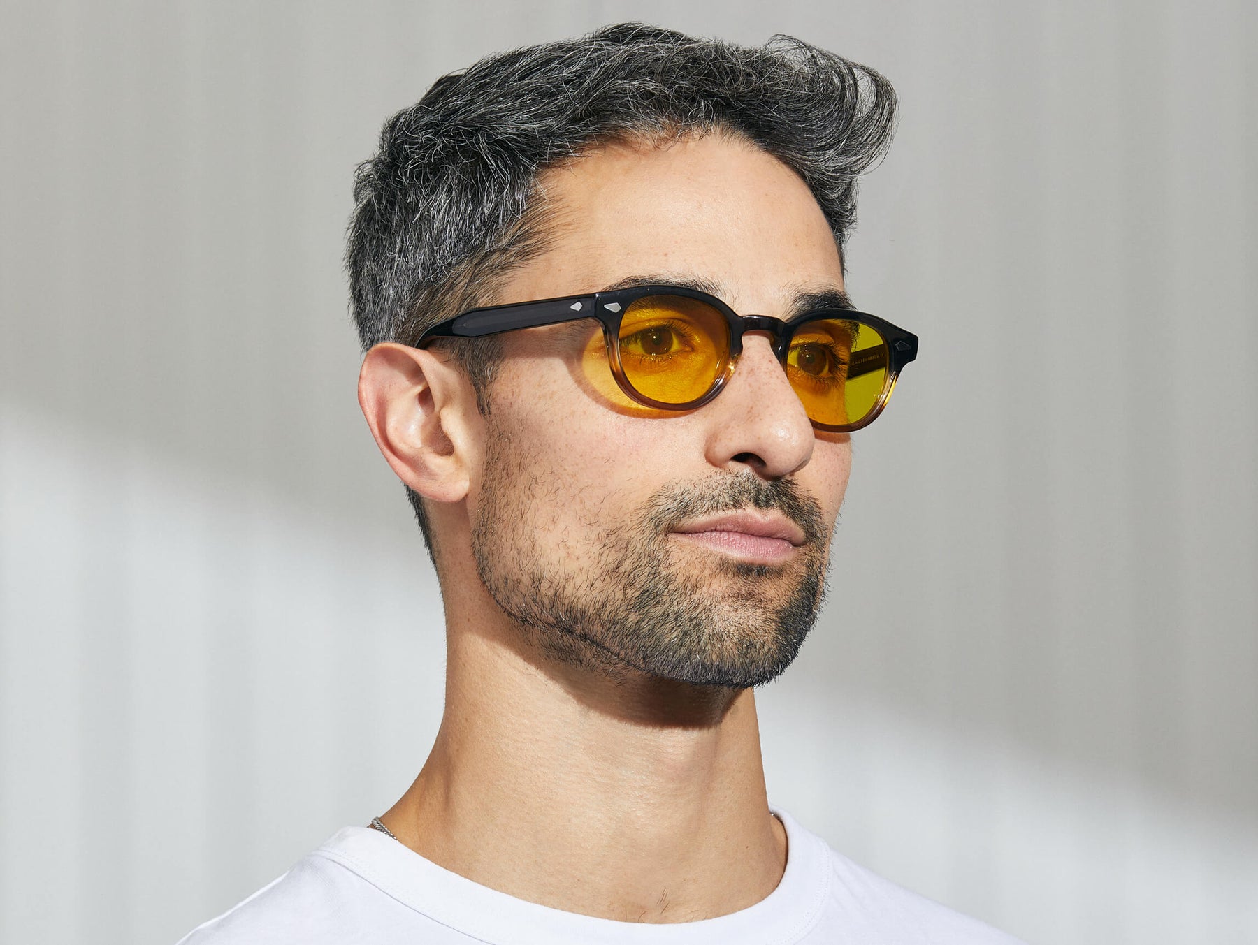 Model is wearing The LEMTOSH in Grey-Brown Fade in size 46 with Mellow Yellow Tinted Lenses Model is wearing The LEMTOSH in Grey-Brown Fade in size 46 with Mellow Yellow Tinted Lenses