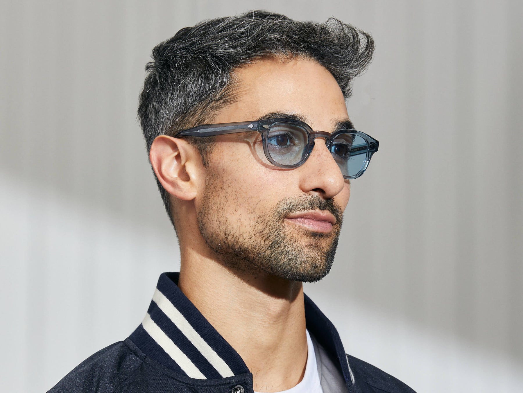 Model is wearing The LEMTOSH in Light Blue in size 46 with Bel Air Blue Tinted Lenses Model is wearing The LEMTOSH in Light Blue in size 46 with Bel Air Blue Tinted Lenses