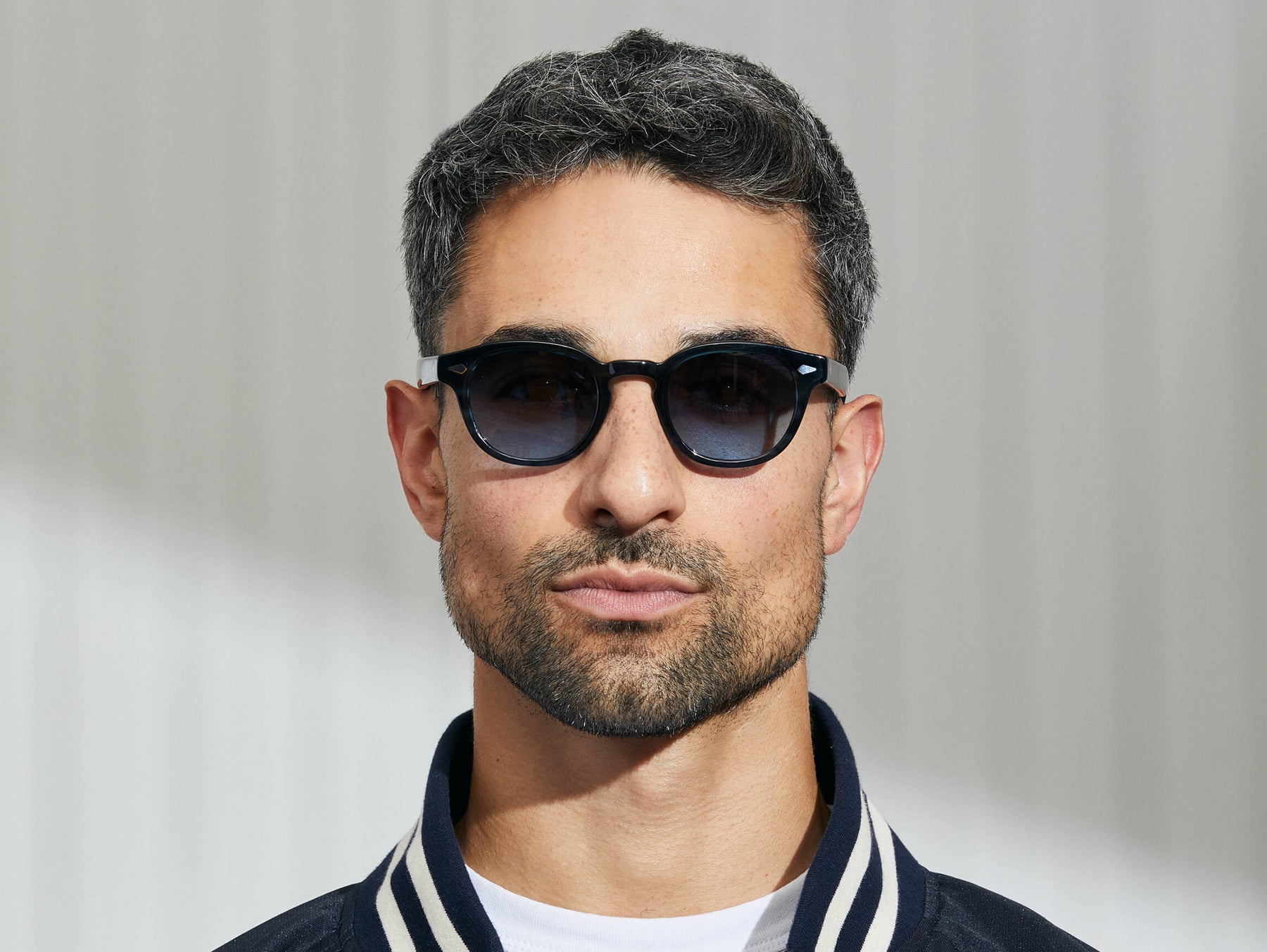 Model is wearing The LEMTOSH in Ink in size 46 with Denim Blue Tinted Lenses Model is wearing The LEMTOSH in Ink in size 46 with Denim Blue Tinted Lenses