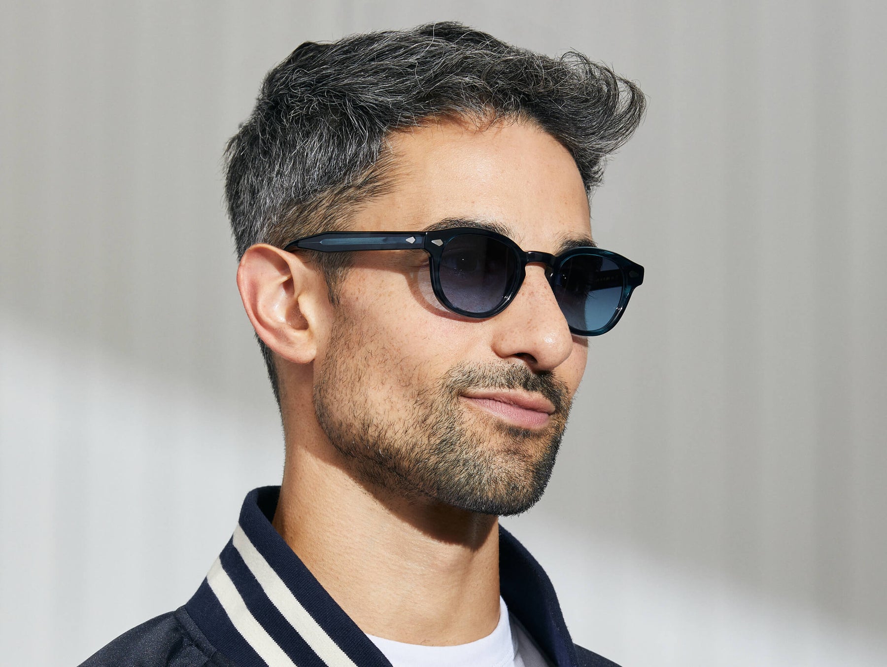 Model is wearing The LEMTOSH in Ink in size 46 with Denim Blue Tinted Lenses Model is wearing The LEMTOSH in Ink in size 46 with Denim Blue Tinted Lenses