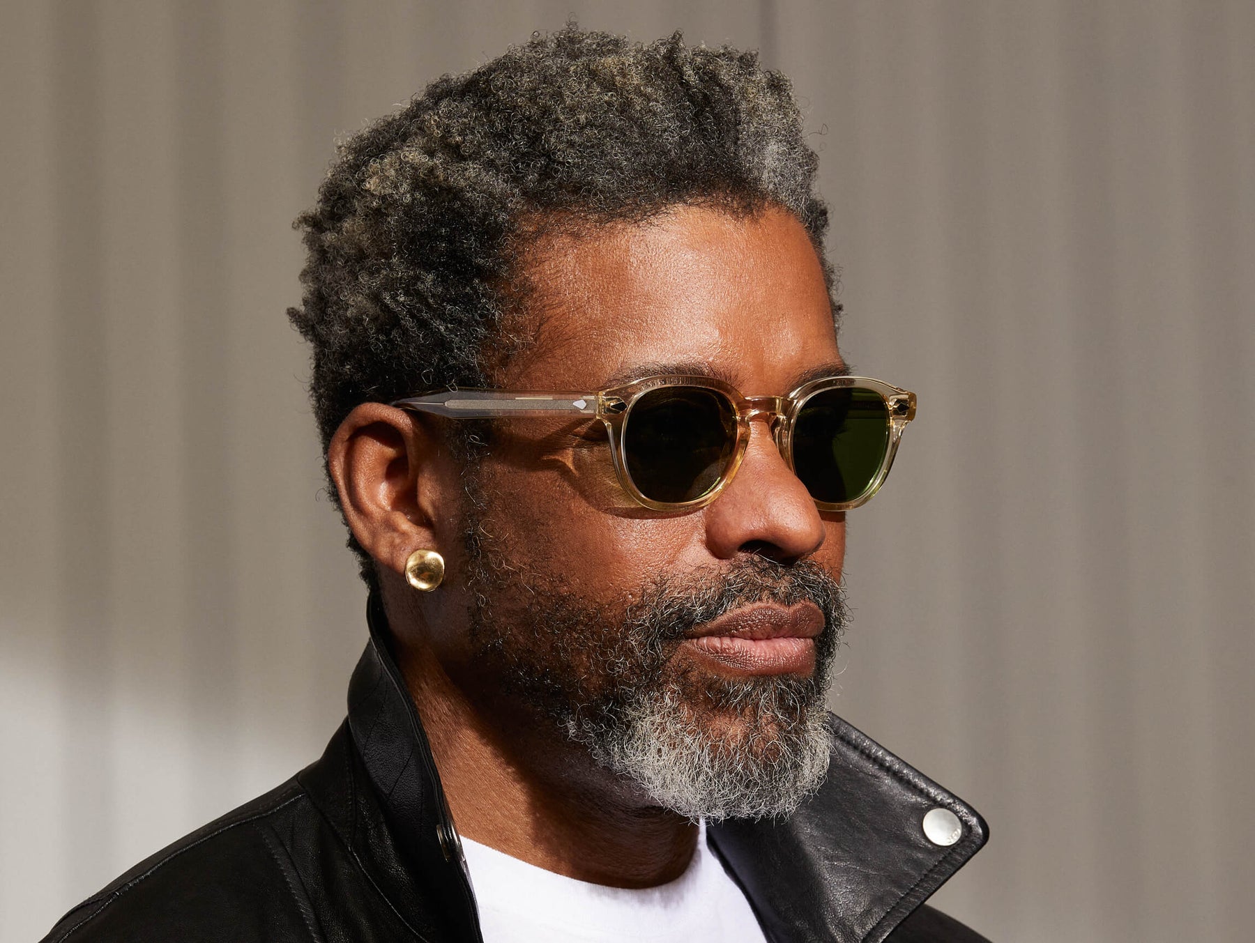 Model is wearing The LEMTOSH SUN in Flesh in size 49 with Calibar Green Glass Lenses Model is wearing The LEMTOSH SUN in Flesh in size 49 with Calibar Green Glass Lenses