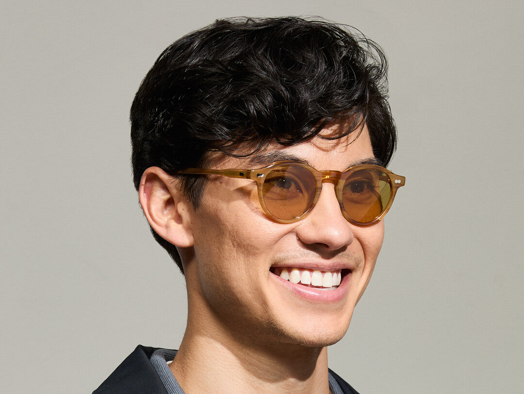 Model is wearing The MILTZEN in Blonde in size 46 with Amber Tinted Lenses Model is wearing The MILTZEN in Blonde in size 46 with Amber Tinted Lenses