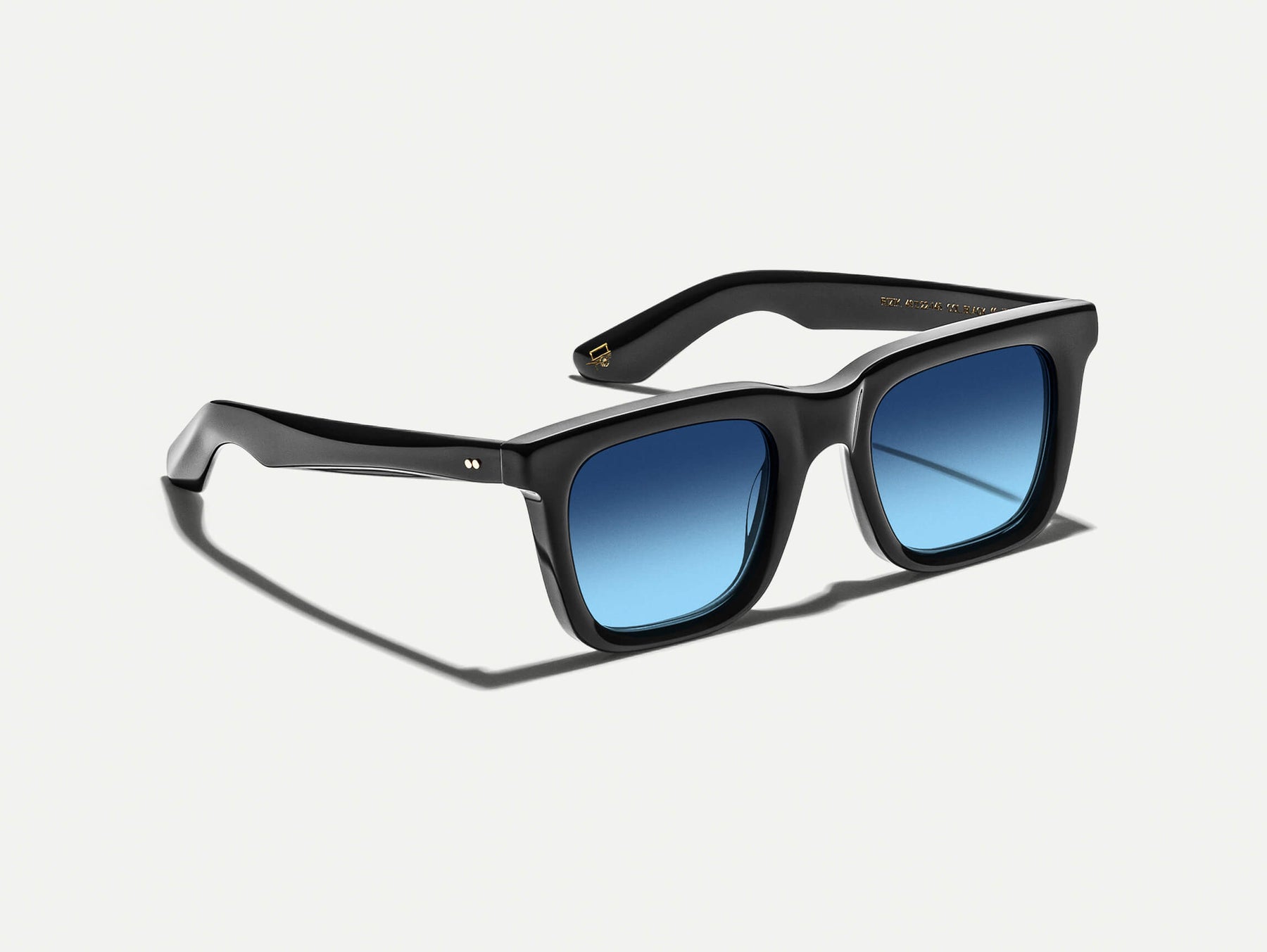 The RIZIK Black with Denim Blue Tinted Lenses The RIZIK Black with Denim Blue Tinted Lenses