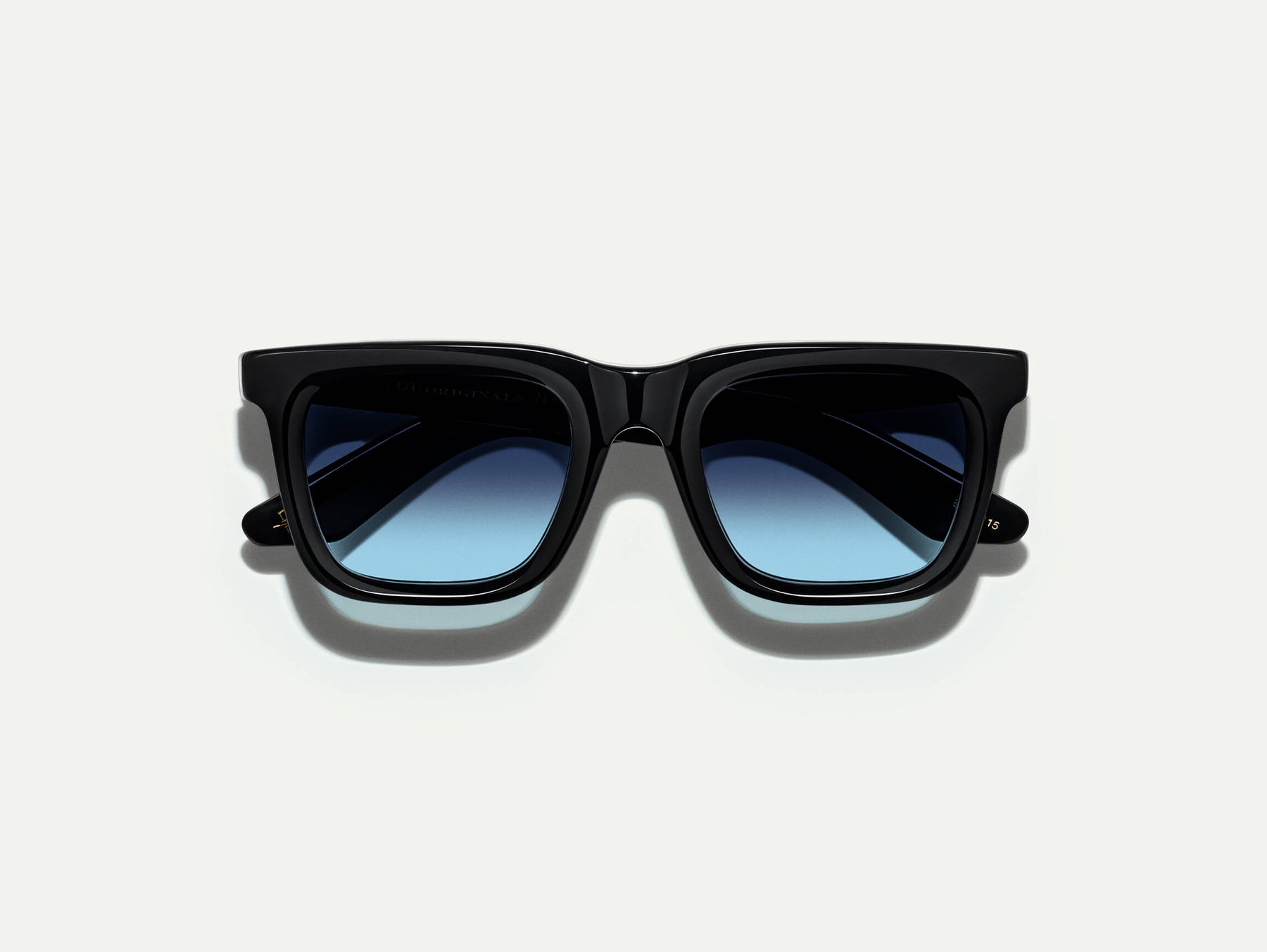 The RIZIK Black with Denim Blue Tinted Lenses The RIZIK Black with Denim Blue Tinted Lenses