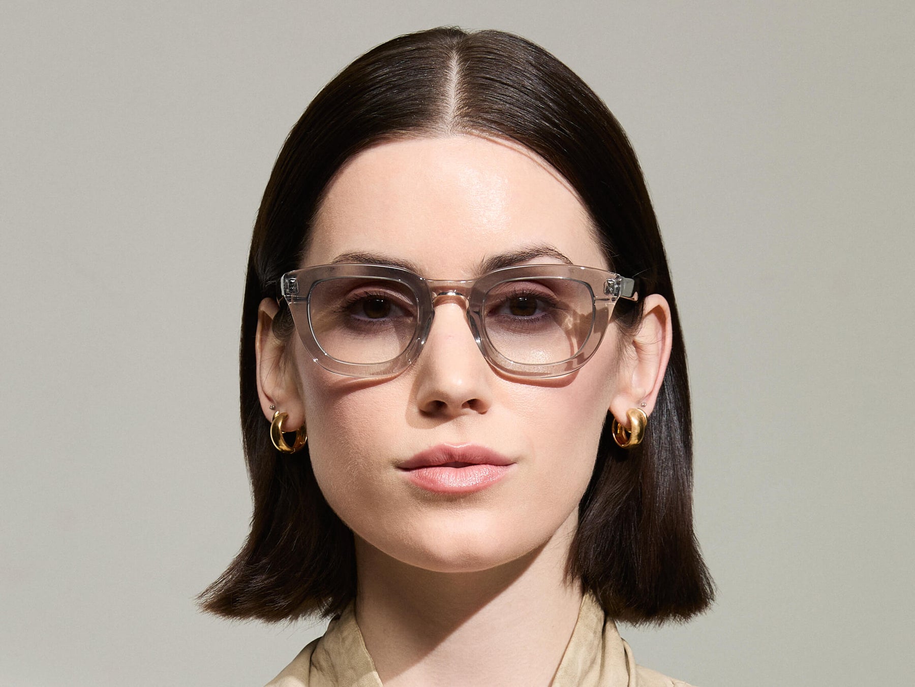 Model is wearing The TELENA in Grey/Light Grey in size 47 with American Grey Fade Tinted Lenses Model is wearing The TELENA in Grey/Light Grey in size 47 with American Grey Fade Tinted Lenses