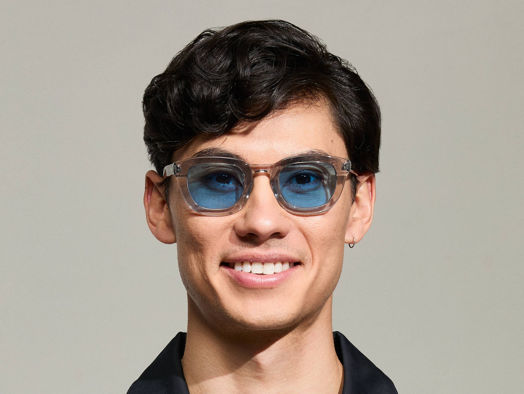 Model is wearing The TELENA in Grey/Light Grey in size 47 with Celebrity Blue Tinted Lenses Model is wearing The TELENA in Grey/Light Grey in size 47 with Celebrity Blue Tinted Lenses