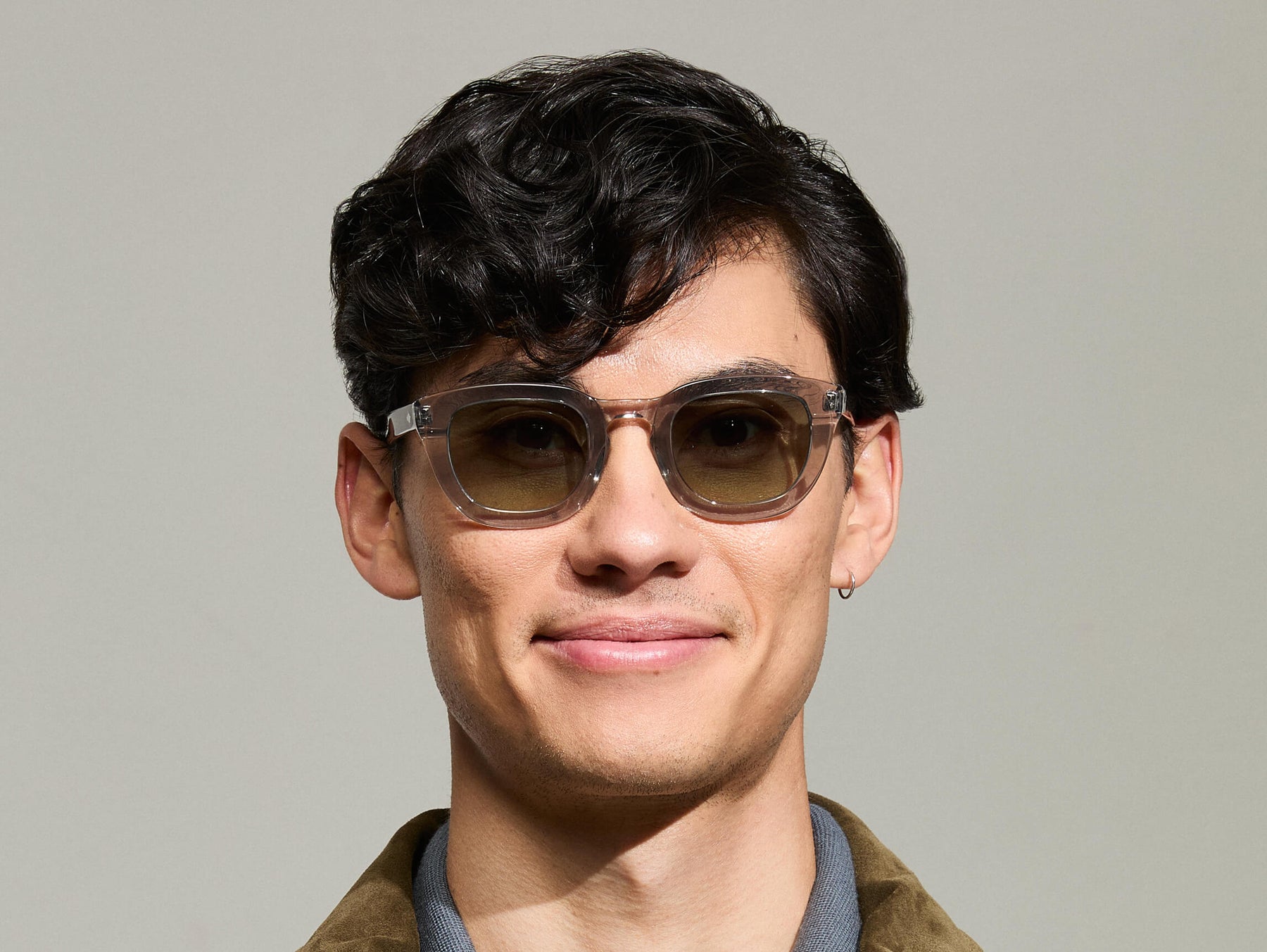 Model is wearing The TELENA in Grey/Light Grey in size 47 with Forest Wood Tinted Lenses Model is wearing The TELENA in Grey/Light Grey in size 47 with Forest Wood Tinted Lenses