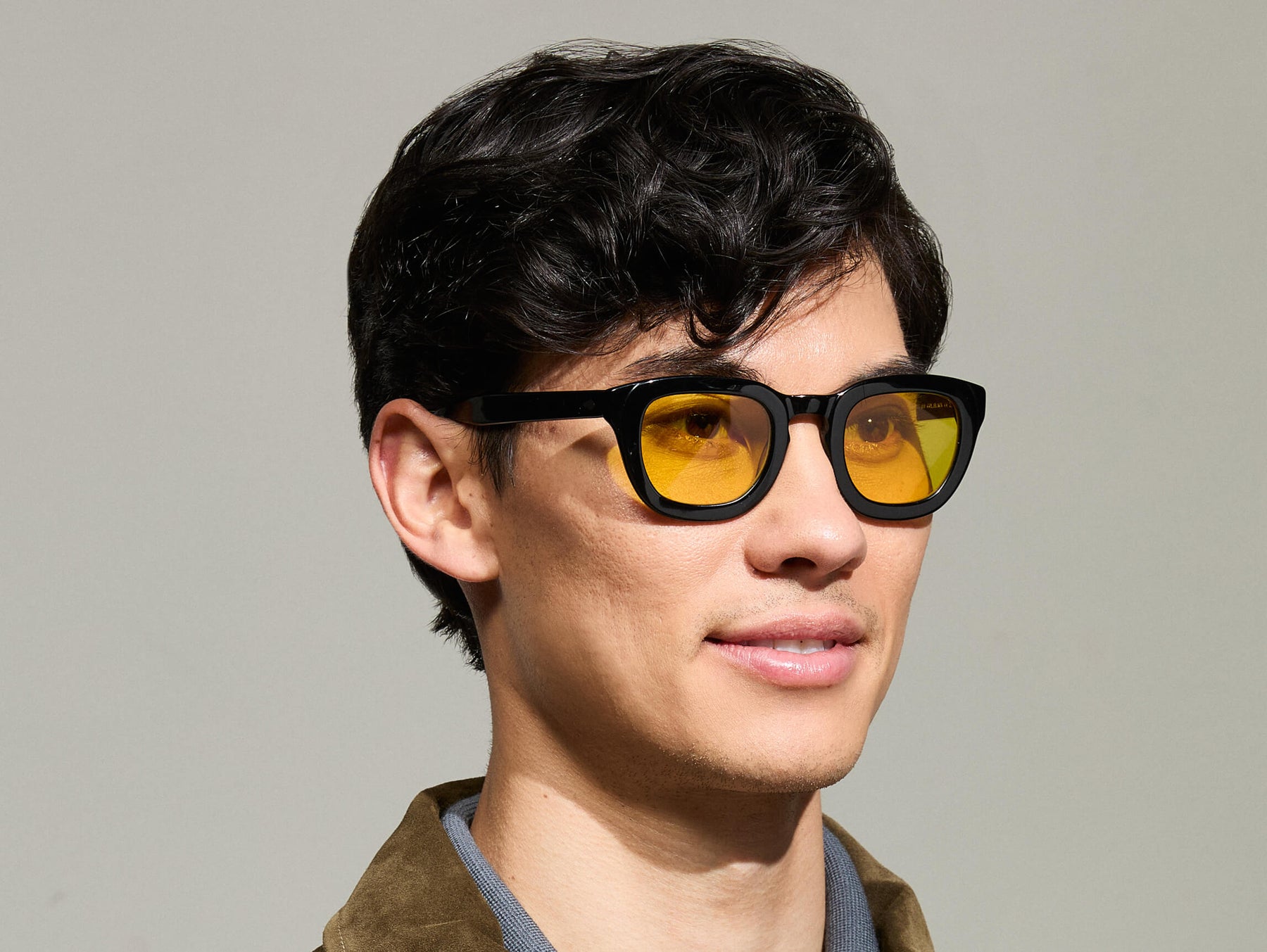 Model is wearing The TELENA in Black in size 47 with Mellow Yellow Tinted Lenses Model is wearing The TELENA in Black in size 47 with Mellow Yellow Tinted Lenses