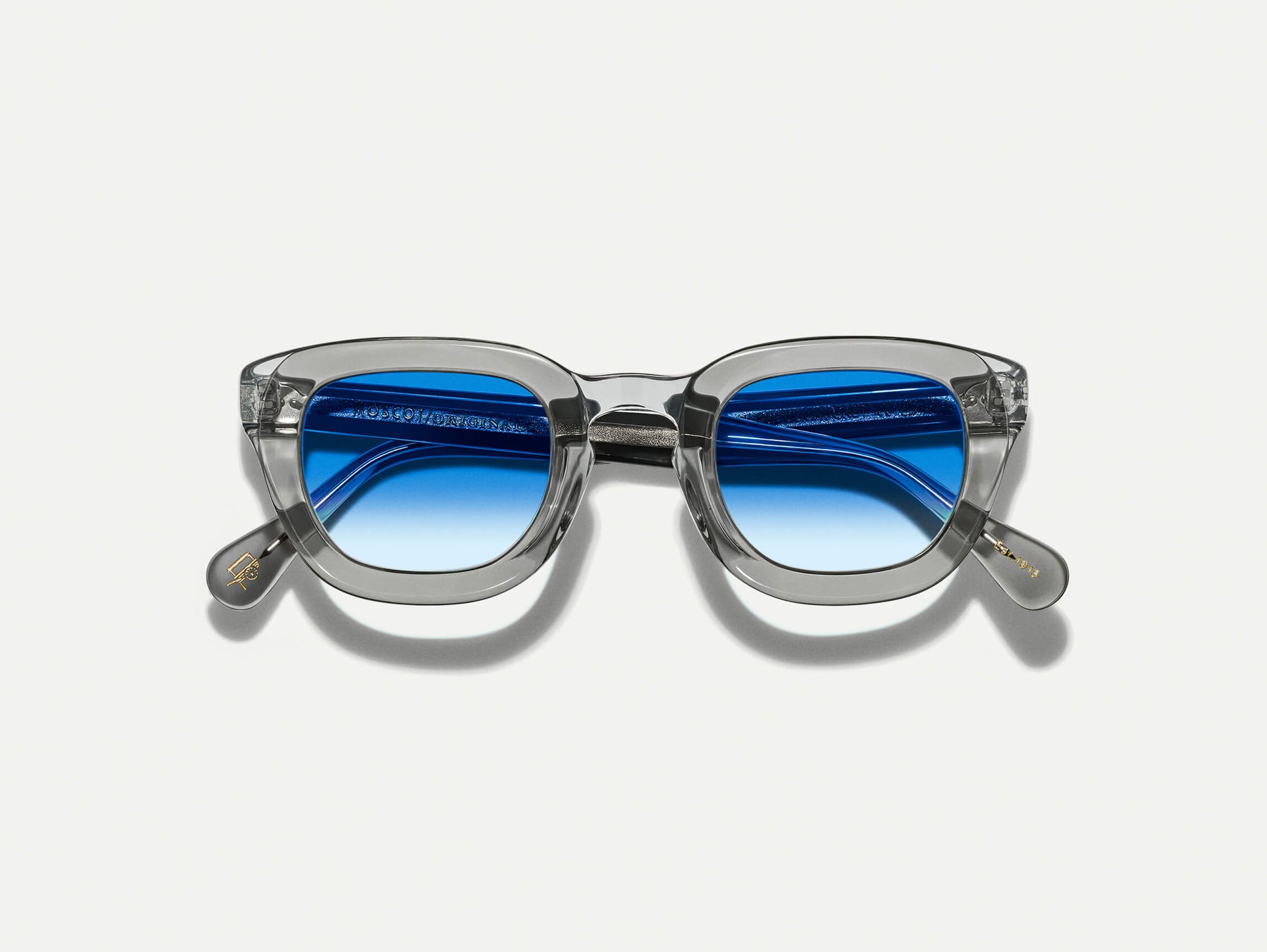 The TELENA in Grey/Light Grey with Broadway Blue Fade Tinted Lenses The TELENA in Grey/Light Grey with Broadway Blue Fade Tinted Lenses