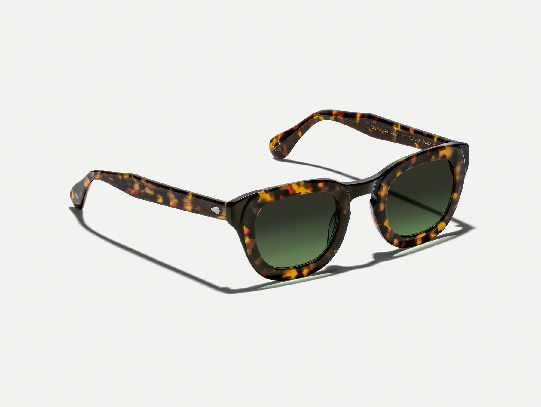 The TELENA in Tortoise/Black with Forest Wood Tinted Lenses The TELENA in Tortoise/Black with Forest Wood Tinted Lenses