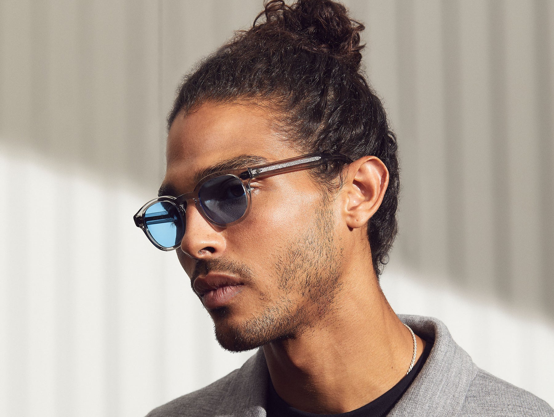 Model is wearing The LEMTOSH in Light Grey in size 46 with Celebrity Blue Tinted Lenses Model is wearing The LEMTOSH in Light Grey in size 46 with Celebrity Blue Tinted Lenses