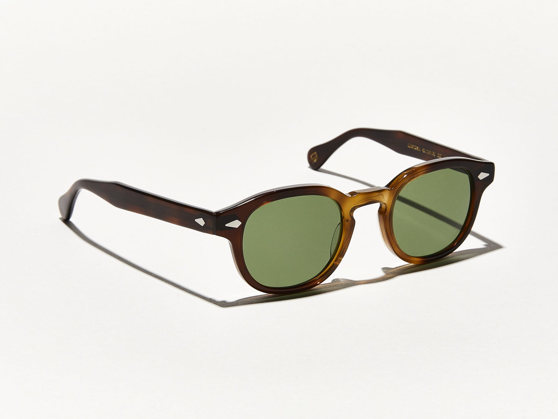 The LEMTOSH SUN in Tobacco with Calibar Green Glass Lenses The LEMTOSH SUN in Tobacco with Calibar Green Glass Lenses