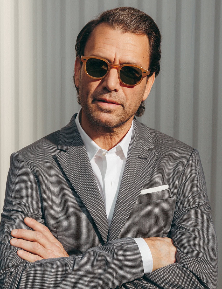 Model is wearing The LEMTOSH SUN in Blonde in size 46 with Calibar Green Glass Lenses Model is wearing The LEMTOSH SUN in Blonde in size 46 with Calibar Green Glass Lenses