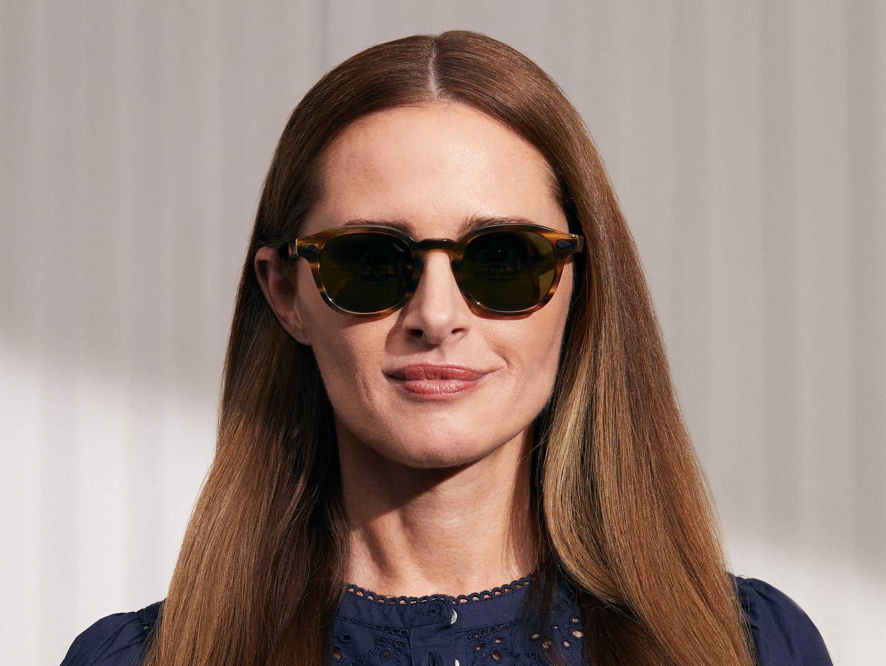 Model is wearing The LEMTOSH SUN in Bamboo in size 49 with Calibar Green Glass Lenses Model is wearing The LEMTOSH SUN in Bamboo in size 49 with Calibar Green Glass Lenses