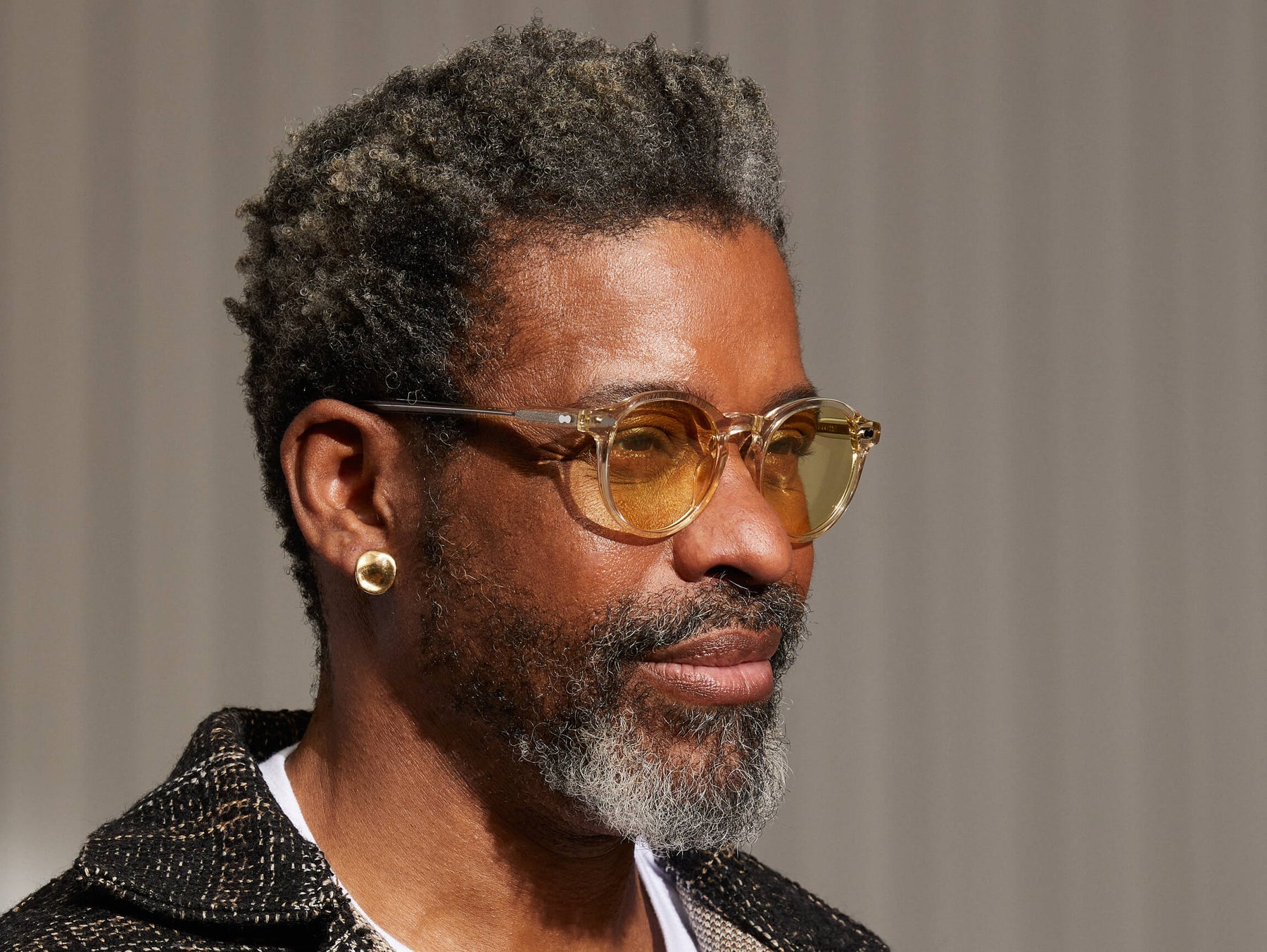 Model is wearing The MILTZEN in Flesh in size 49 with Pastel Yellow Tinted Lenses Model is wearing The MILTZEN in Flesh in size 49 with Pastel Yellow Tinted Lenses