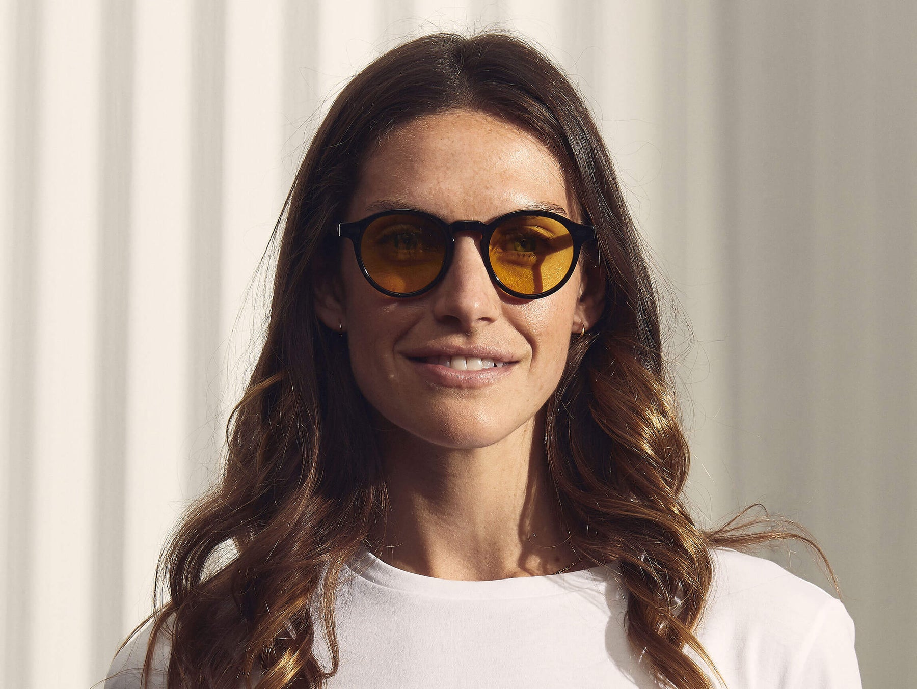 Model is wearing The MILTZEN in Black in size 46 with Mellow Yellow Tinted Lenses Model is wearing The MILTZEN in Black in size 46 with Mellow Yellow Tinted Lenses
