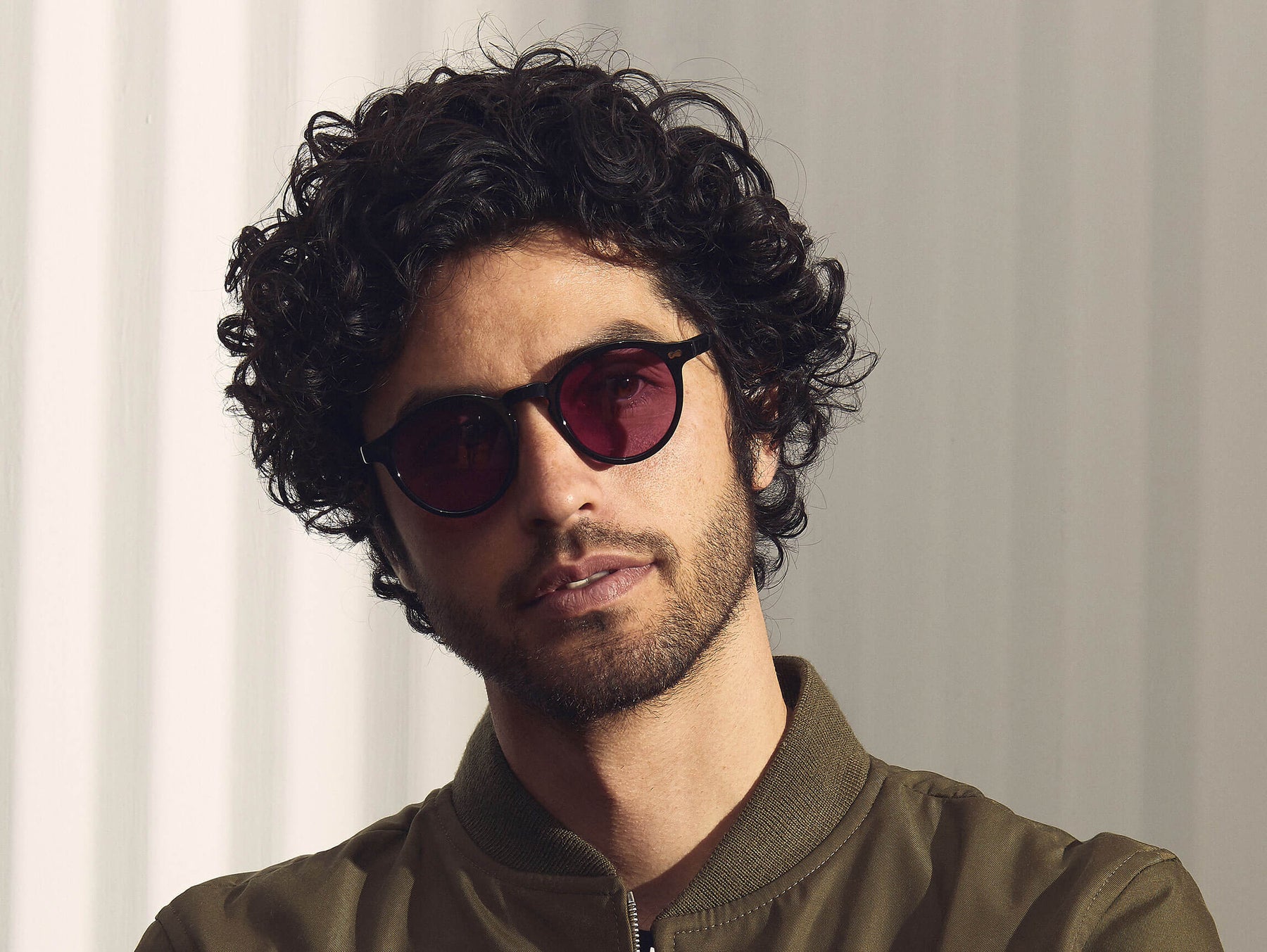 Model is wearing The MILTZEN in Black in size 49 with Purple Nurple Tinted Lenses Model is wearing The MILTZEN in Black in size 49 with Purple Nurple Tinted Lenses