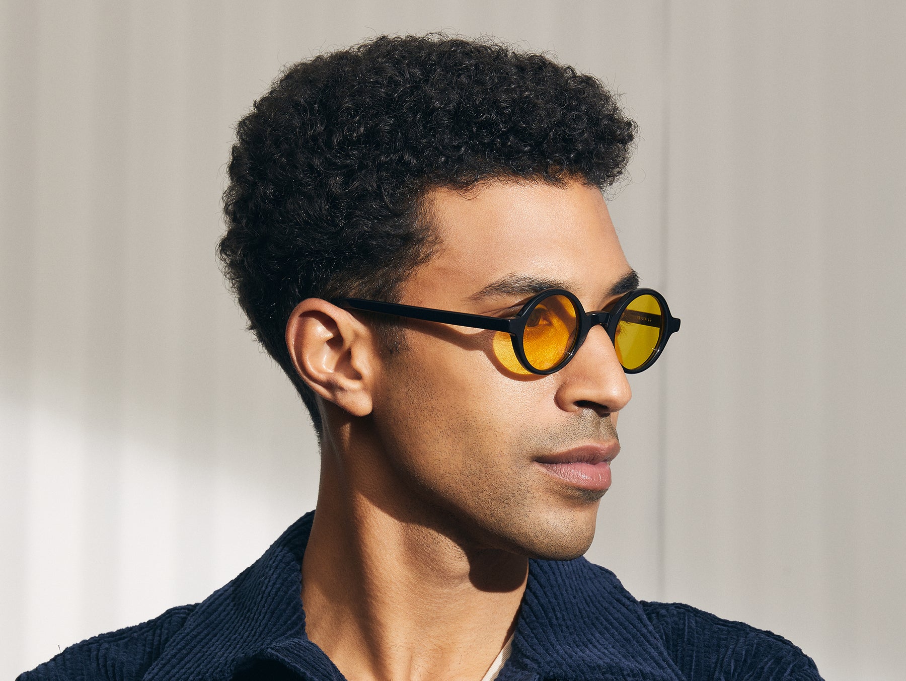 Model is wearing The ZOLMAN in Black in size 42 with Mellow Yellow Tinted Lenses Model is wearing The ZOLMAN in Black in size 42 with Mellow Yellow Tinted Lenses
