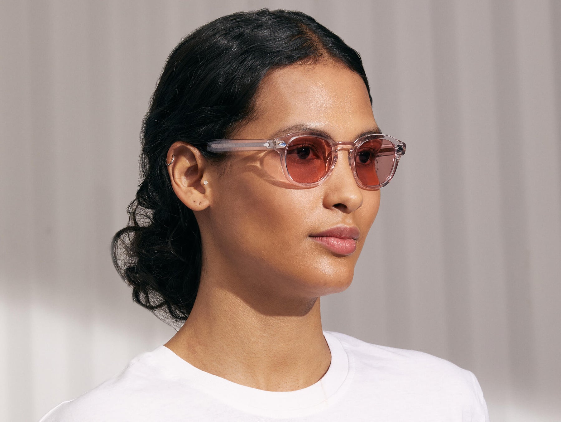 Model is wearing The LEMTOSH in Blush in size 46 with New York Rose Tinted Lenses Model is wearing The LEMTOSH in Blush in size 46 with New York Rose Tinted Lenses