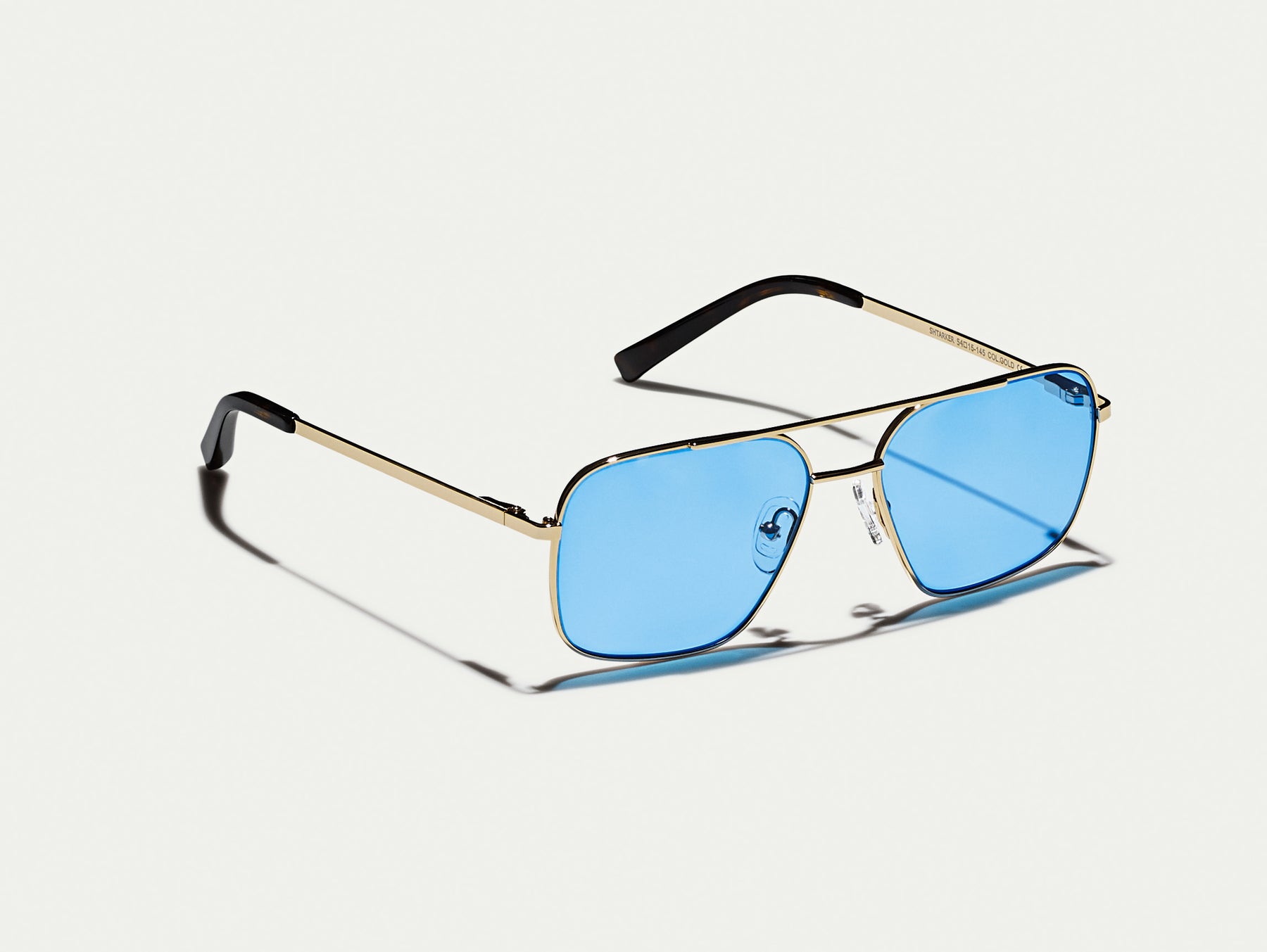 The SHTARKER in Gold with Celebrity Blue Tinted Lenses The SHTARKER in Gold with Celebrity Blue Tinted Lenses