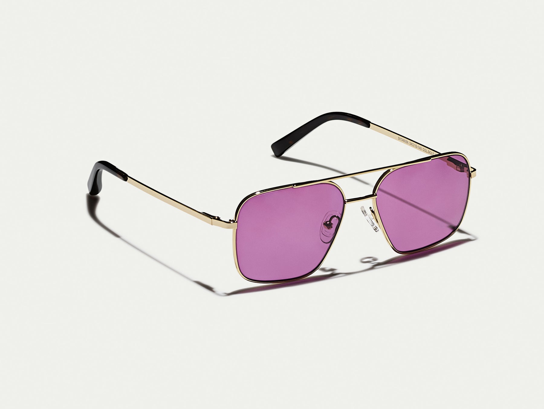 The SHTARKER in Gold with Purple Nurple Tinted Lenses The SHTARKER in Gold with Purple Nurple Tinted Lenses